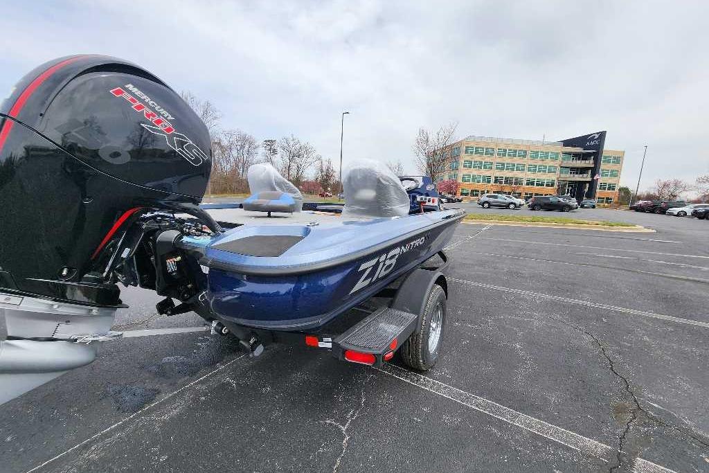 2026 Nitro Z18 Pro boat with powerful engine in parking lot.