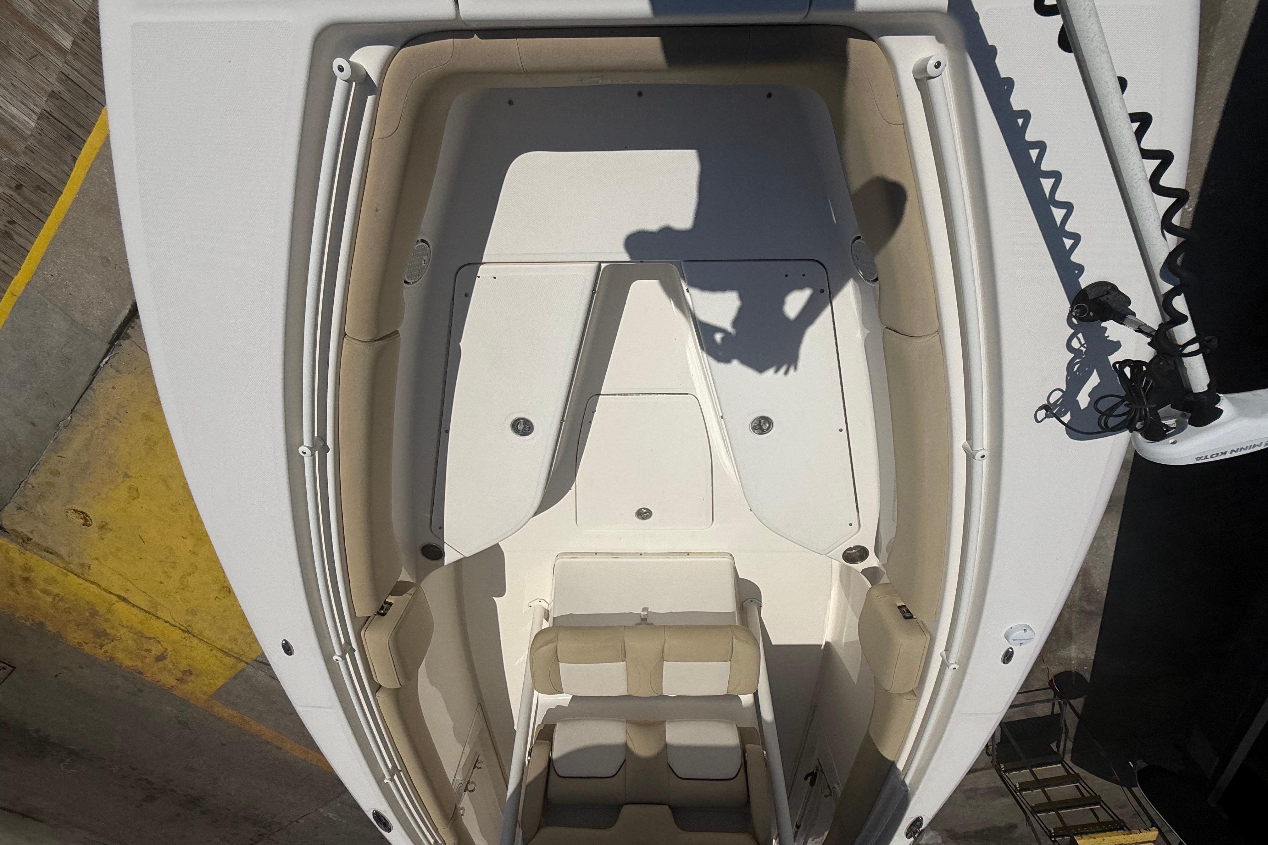 2019 Key West Billistic 281 Center Console boat interior, featuring spacious seating and storage.