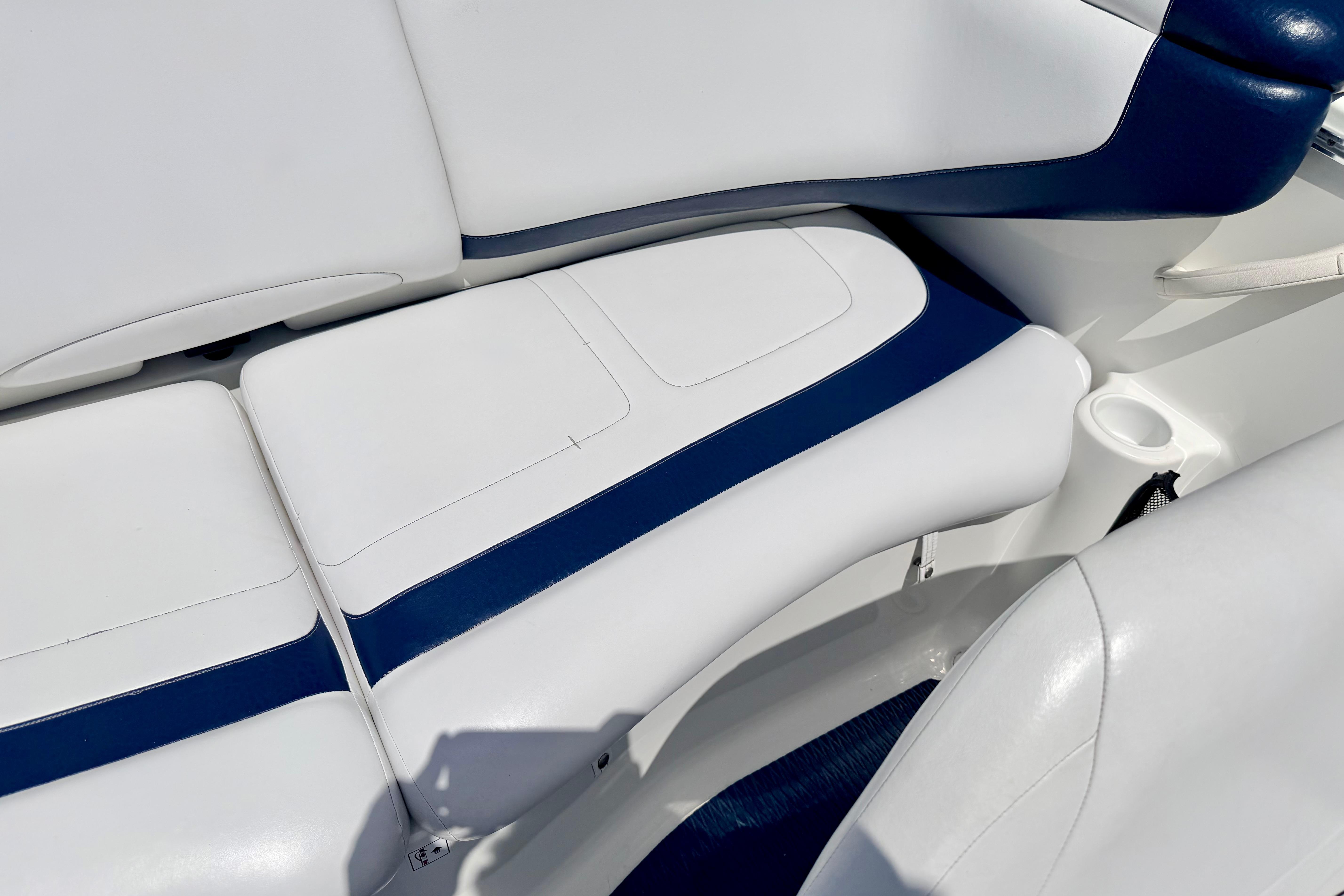 2004 Bombardier SEADOO Utopia 185 boat interior with white and blue seating.