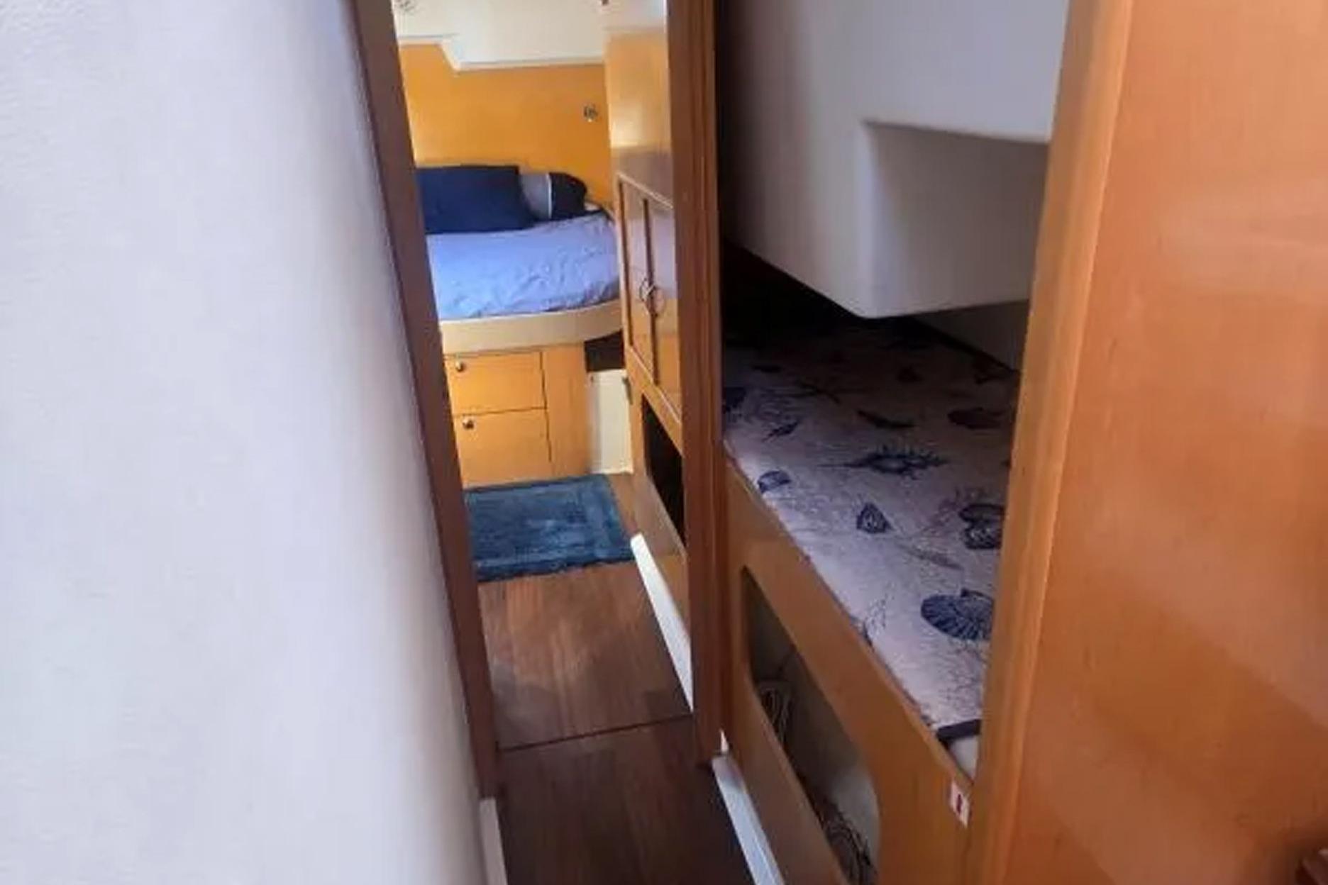 Interior view of 2008 Fountaine Pajot Salina 48 catamaran with cozy cabin spaces.