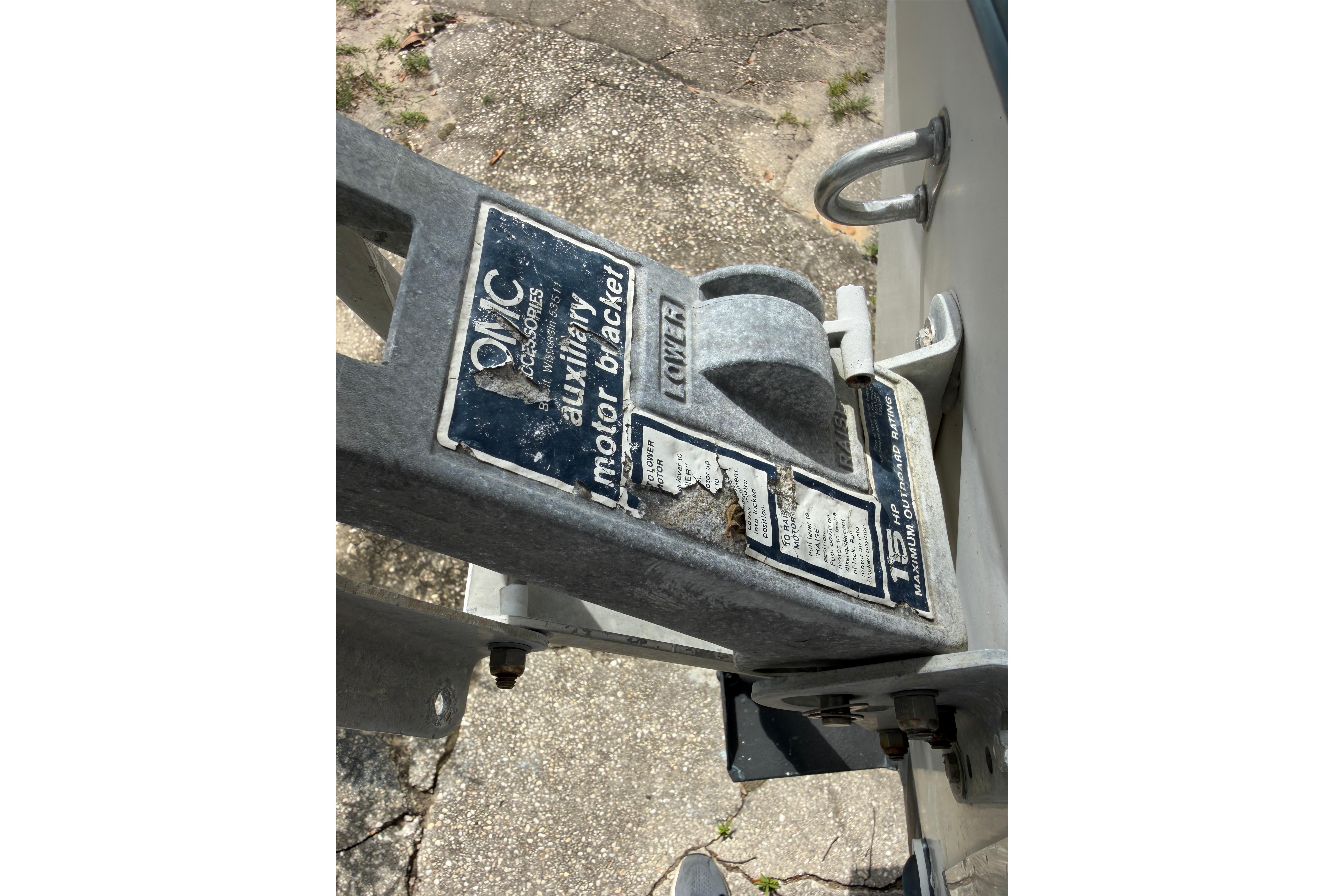OMC auxiliary motor bracket on 1987 Grady-White Seafarer 226 boat.