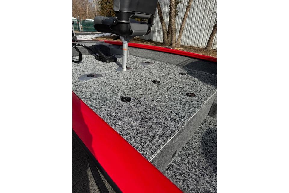 2026 Tracker Pro Team 175 Crappie Edition boat with gray carpeted deck and seat.