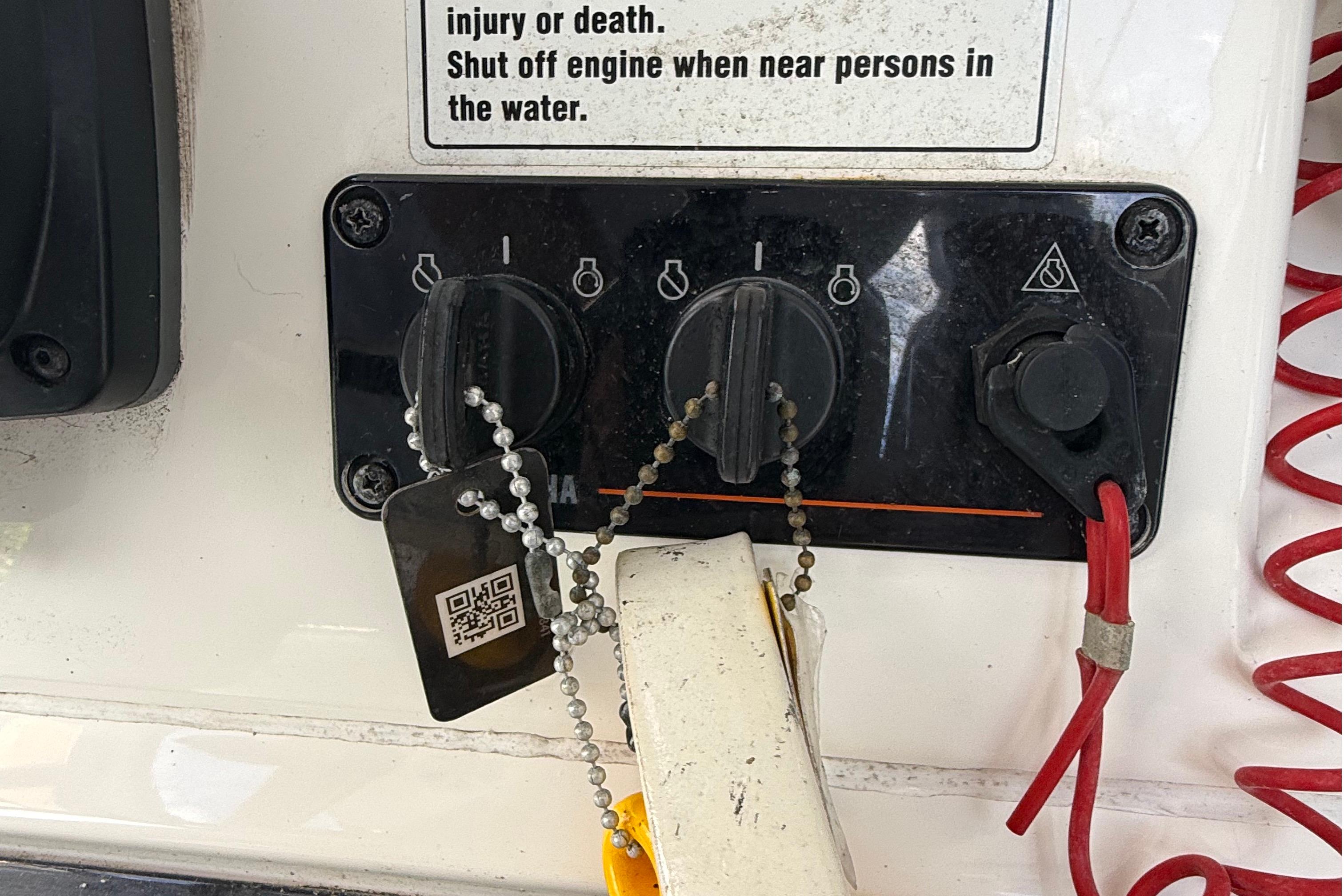 Control panel of a 2008 Century 2901 Center Console boat with safety warning.