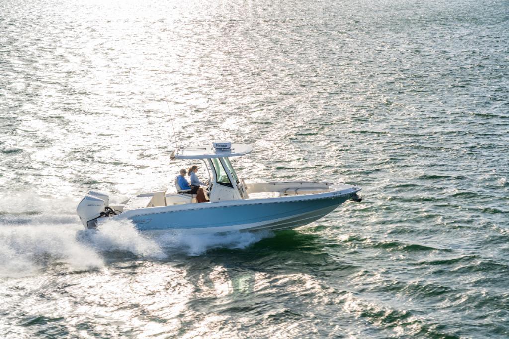 2024 Boston Whaler 280 Dauntless cruising on open water.