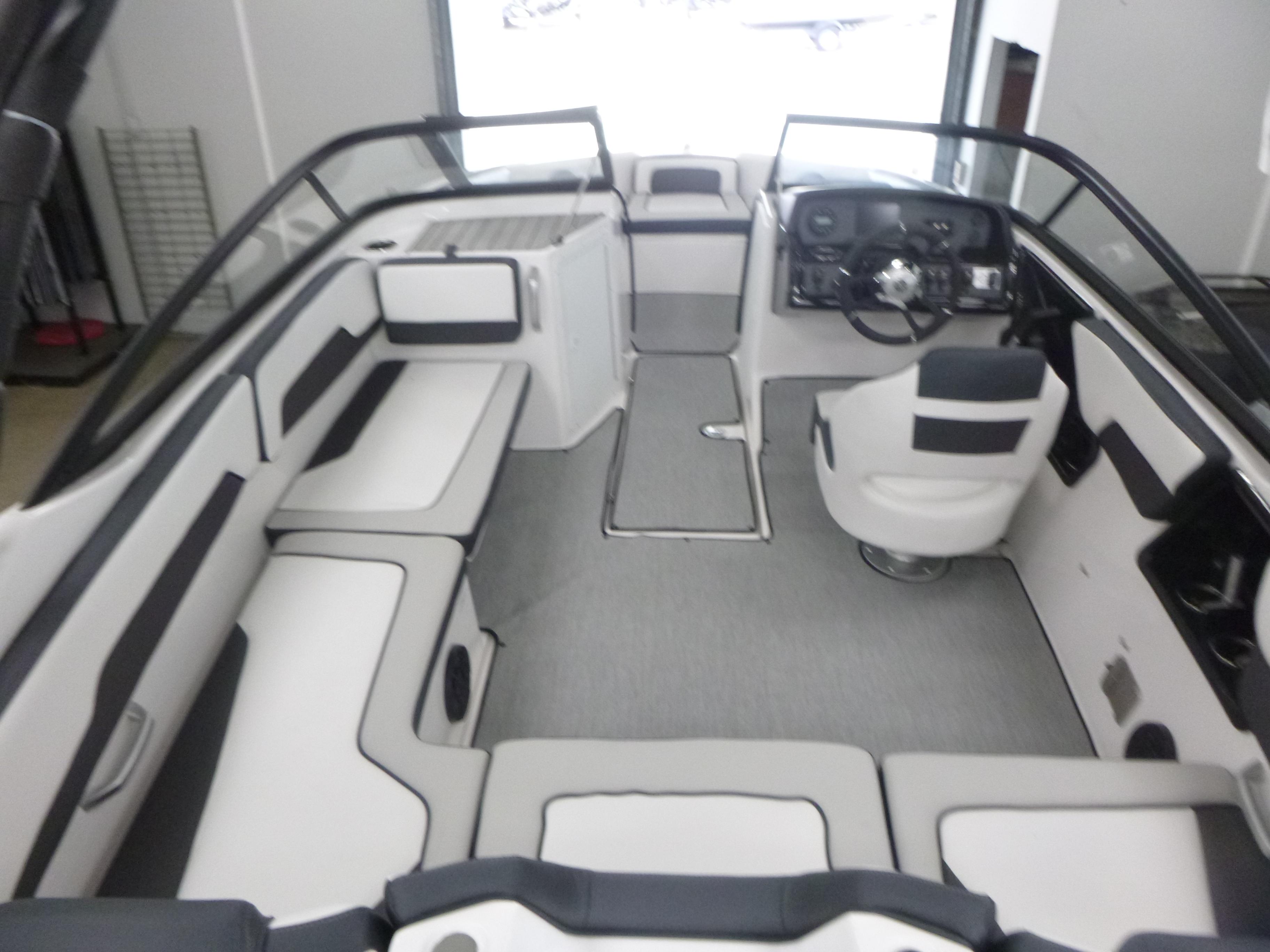 2025 Yamaha Boats AR195 interior with sleek seating and modern dashboard design.