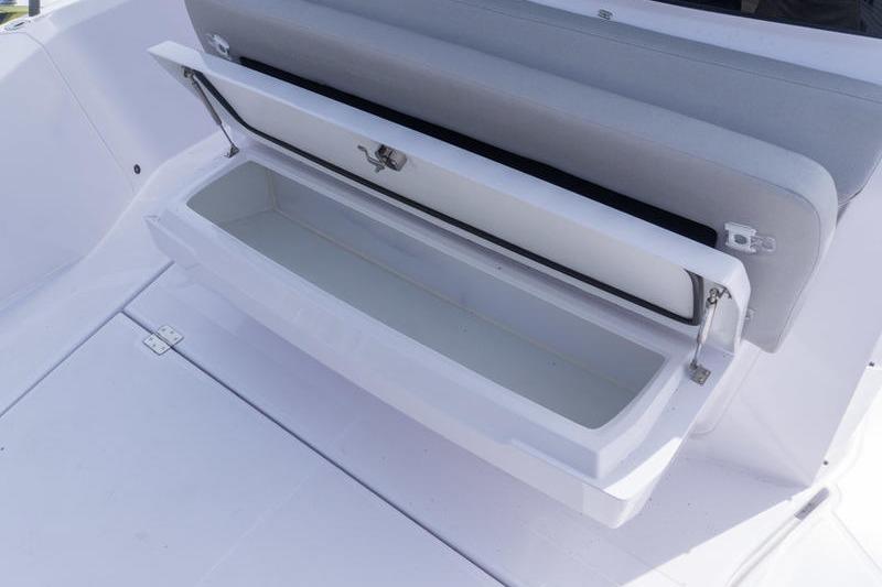 2025 Axopar 29 XC Cross Cabin storage compartment, open and empty, showcasing interior space.