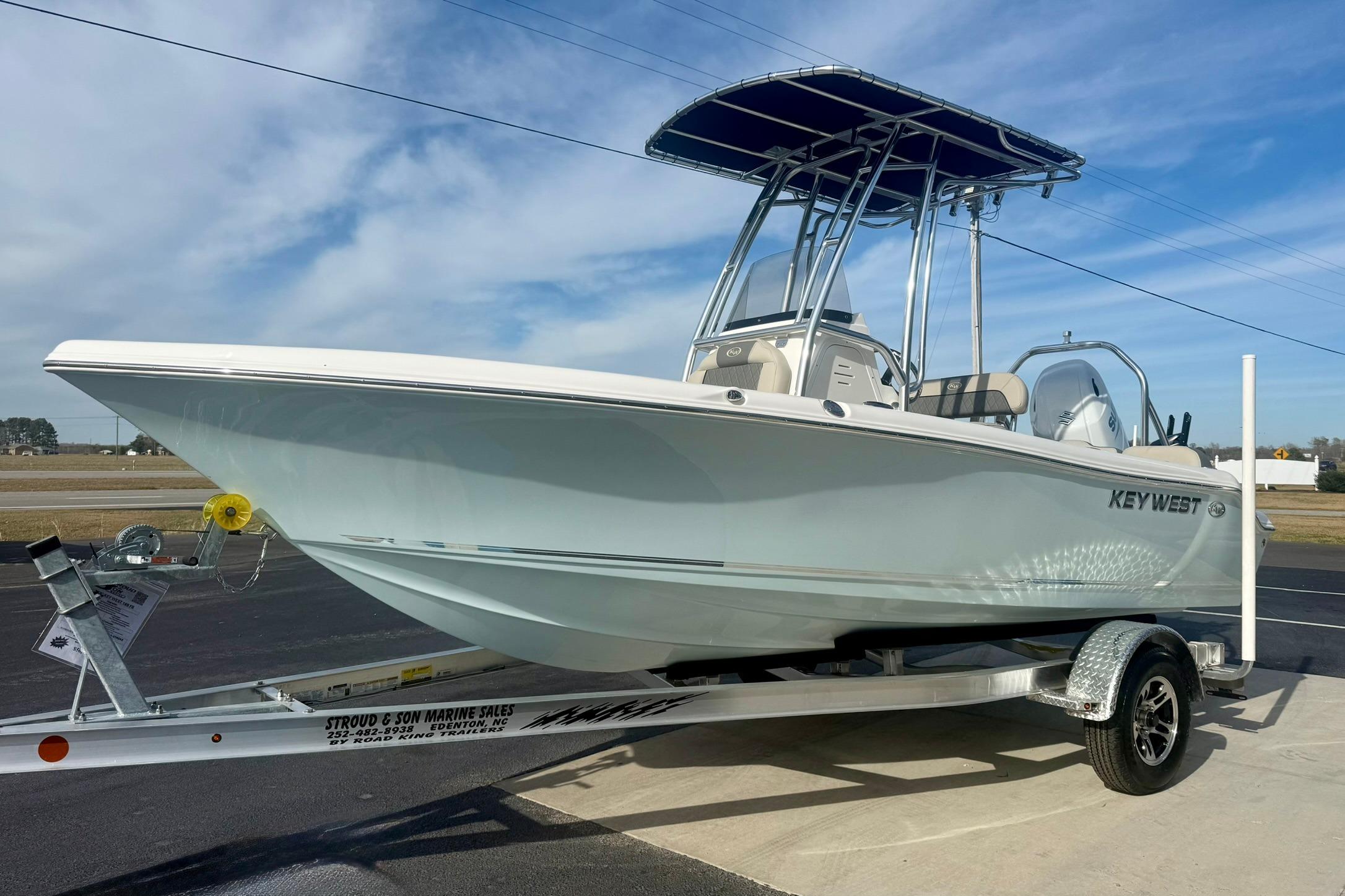 2026 Key West 189 FS boat on trailer under clear blue sky.