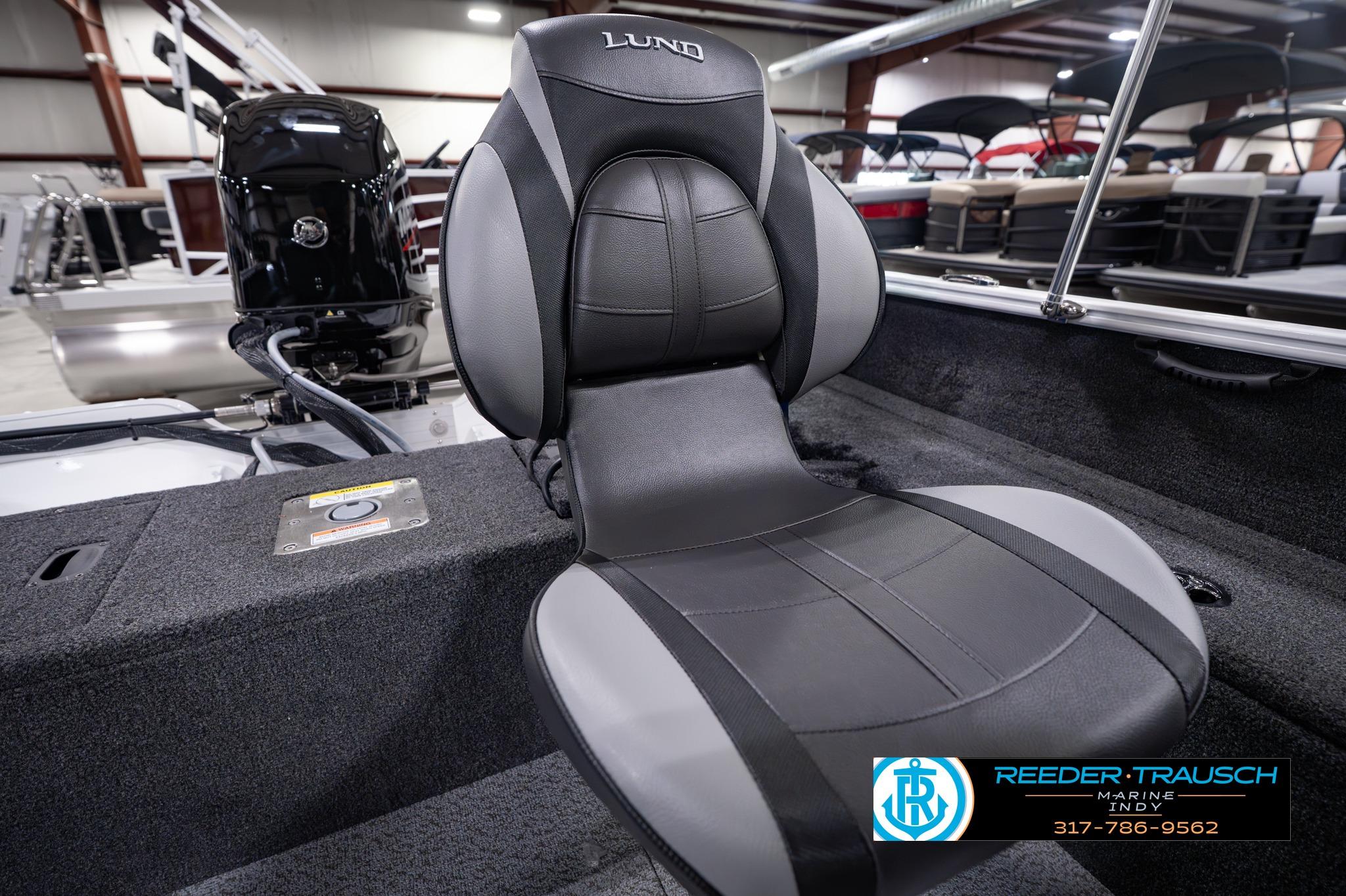 2026 Lund 1650 Rebel XL SS boat seat in showroom, featuring sleek design and comfortable upholstery.