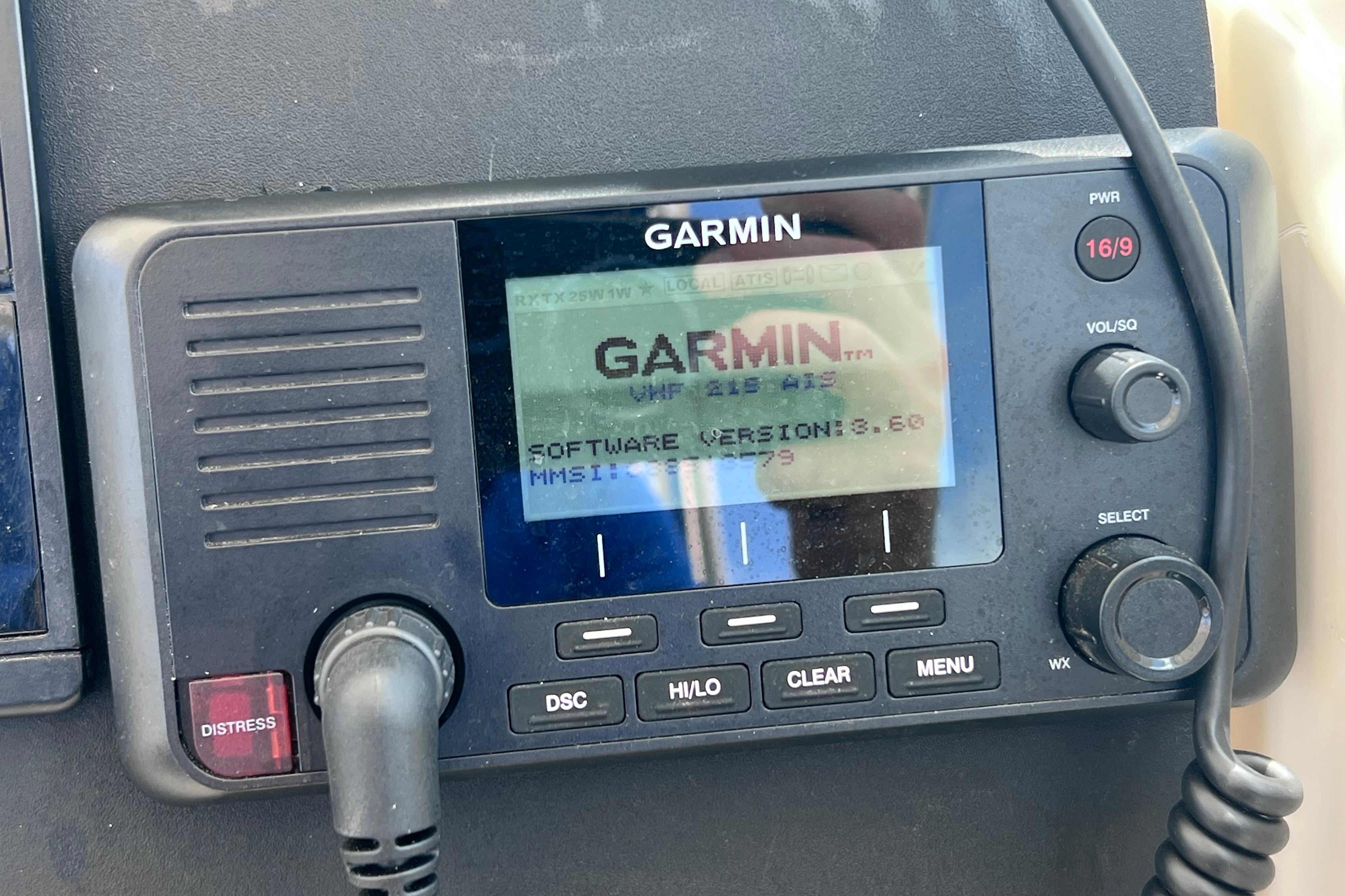 Garmin marine radio on 2004 Pursuit 2870 Walkaround boat dashboard.