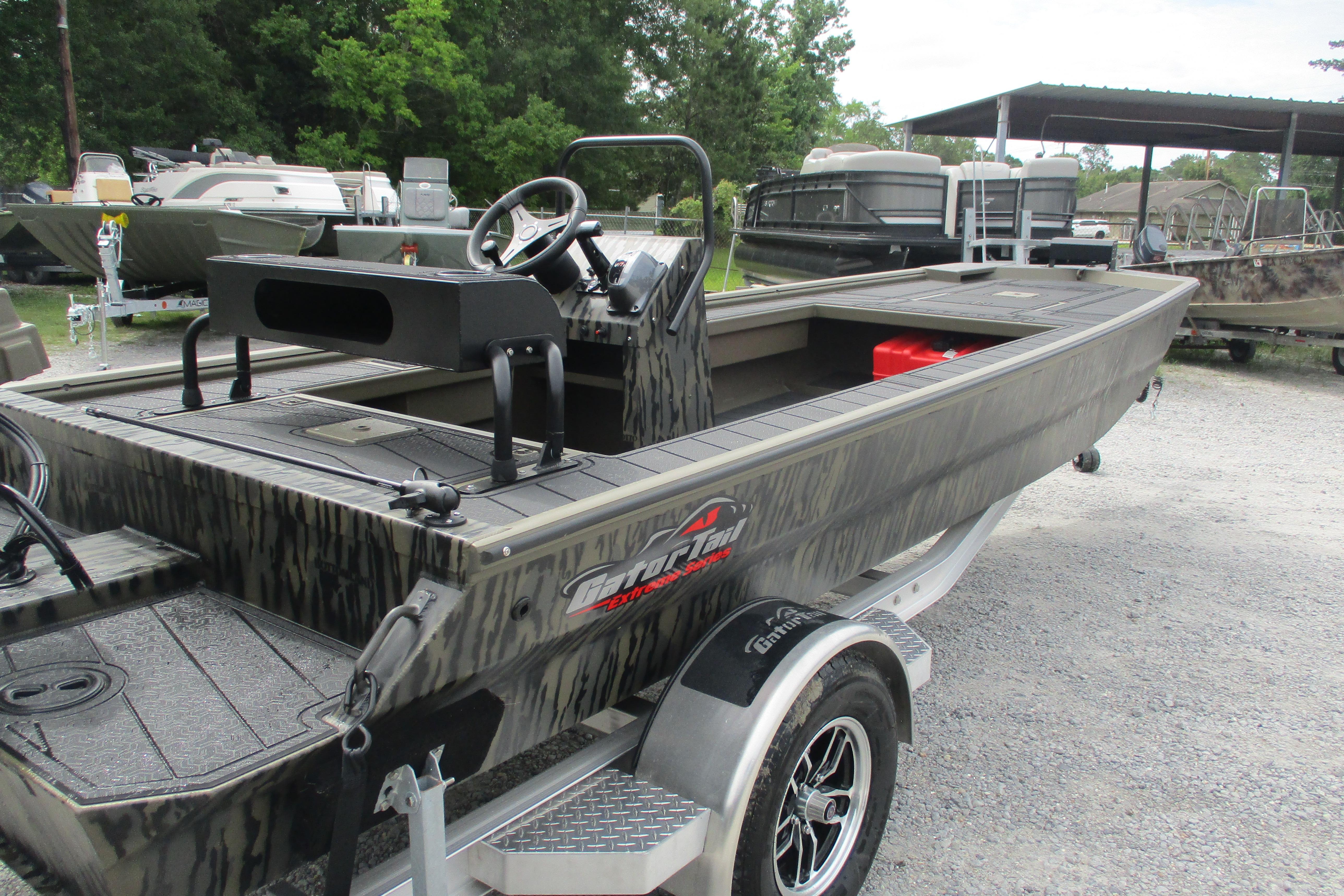 2026 Gator Tail 2060 Extreme CC boat on trailer, parked outdoors.