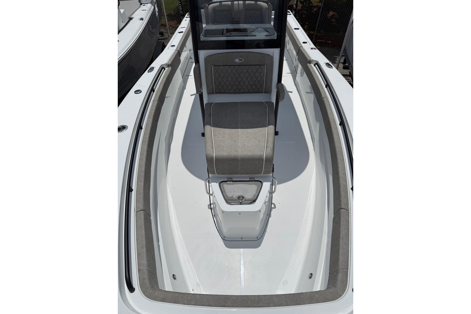 2026 Sea Hunt Gamefish 27 Coffin Box boat interior with cushioned seating and sleek design.