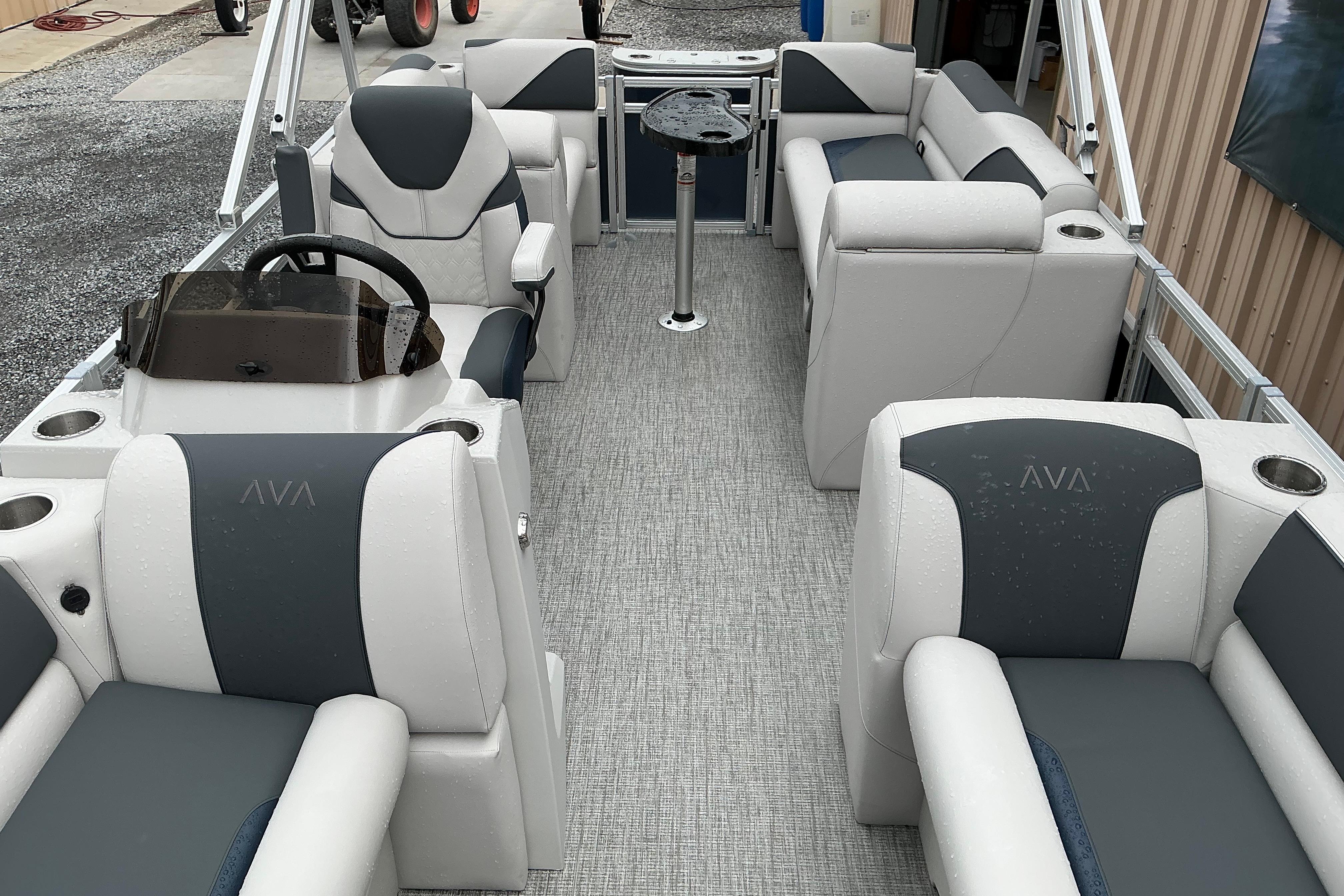 2026 Avalon Venture Quad Lounge boat interior with plush seating and modern design.