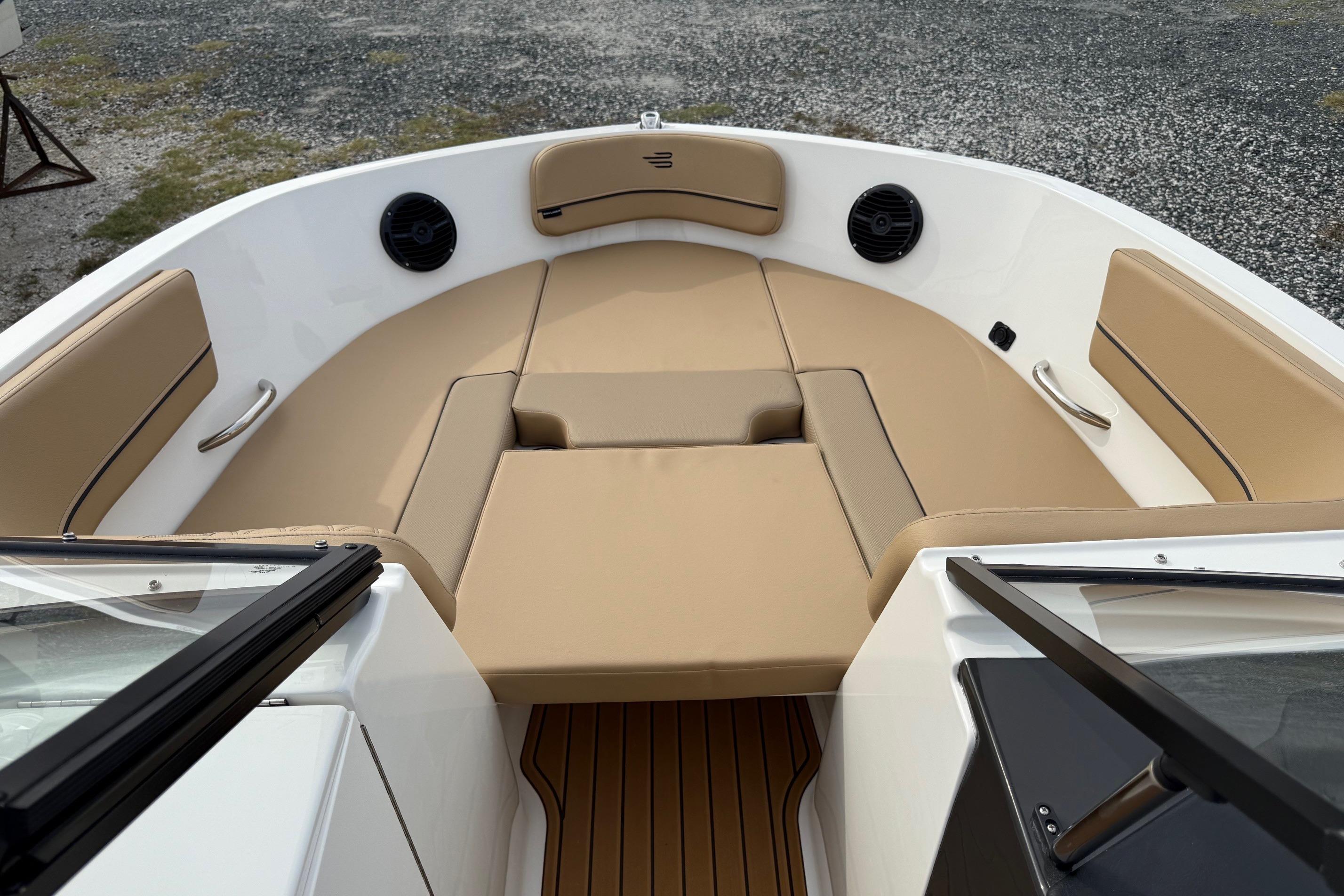 2026 Bayliner VR6 Bowrider OB with tan seating and sleek design.