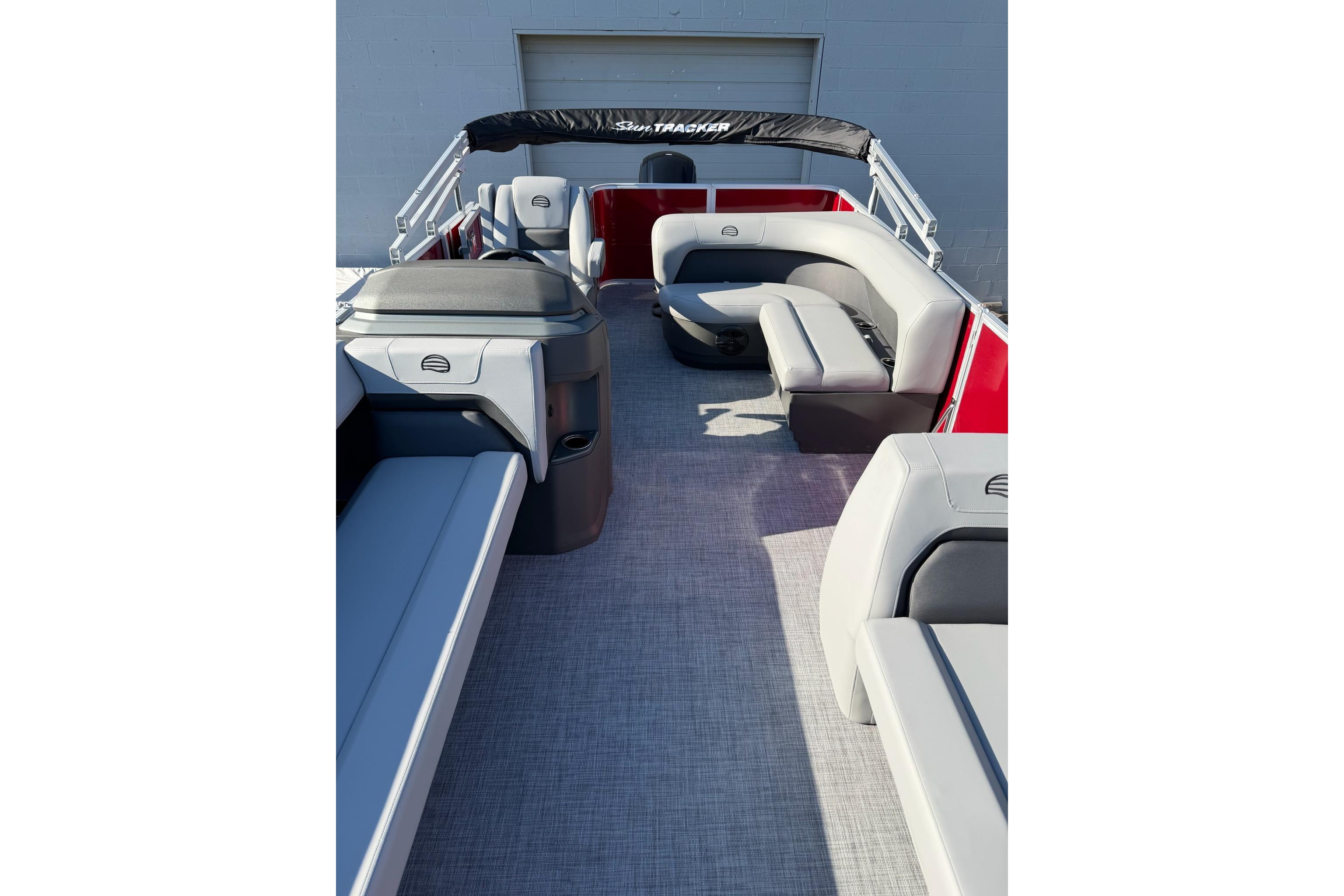 Interior of 2026 Sun Tracker Party Barge 18 DLX pontoon boat with spacious seating.