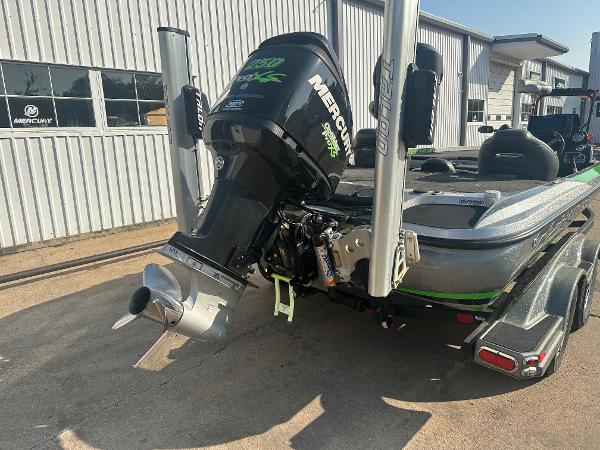 2017 Nitro Z21 Z-Pro High Performance boat with Mercury engine, parked outside a building.