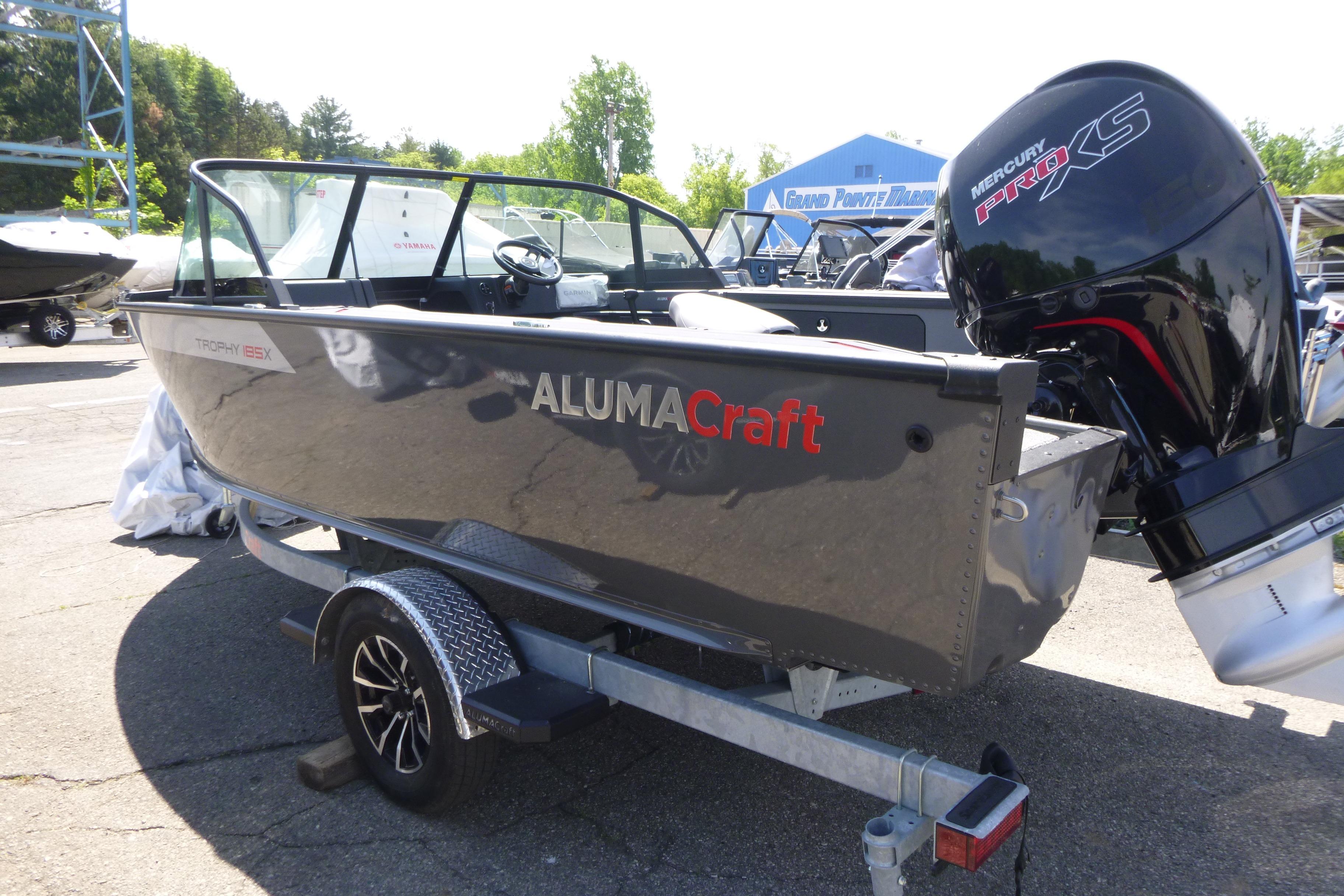 2025 Alumacraft Trophy 185X Sport boat with Mercury Pro XS engine on trailer.
