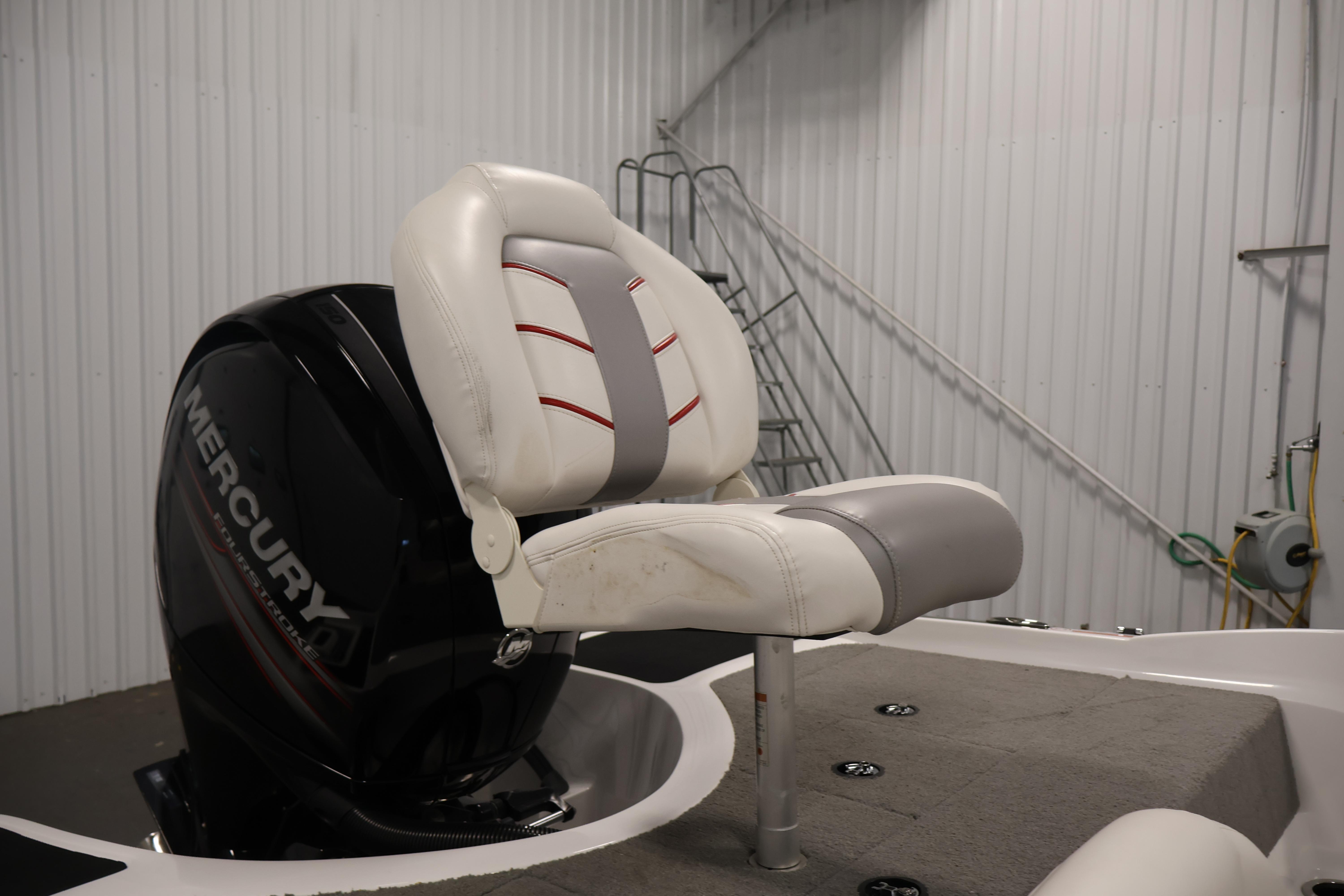 2019 Nitro Z19 Sport boat seat with Mercury engine in a garage setting.