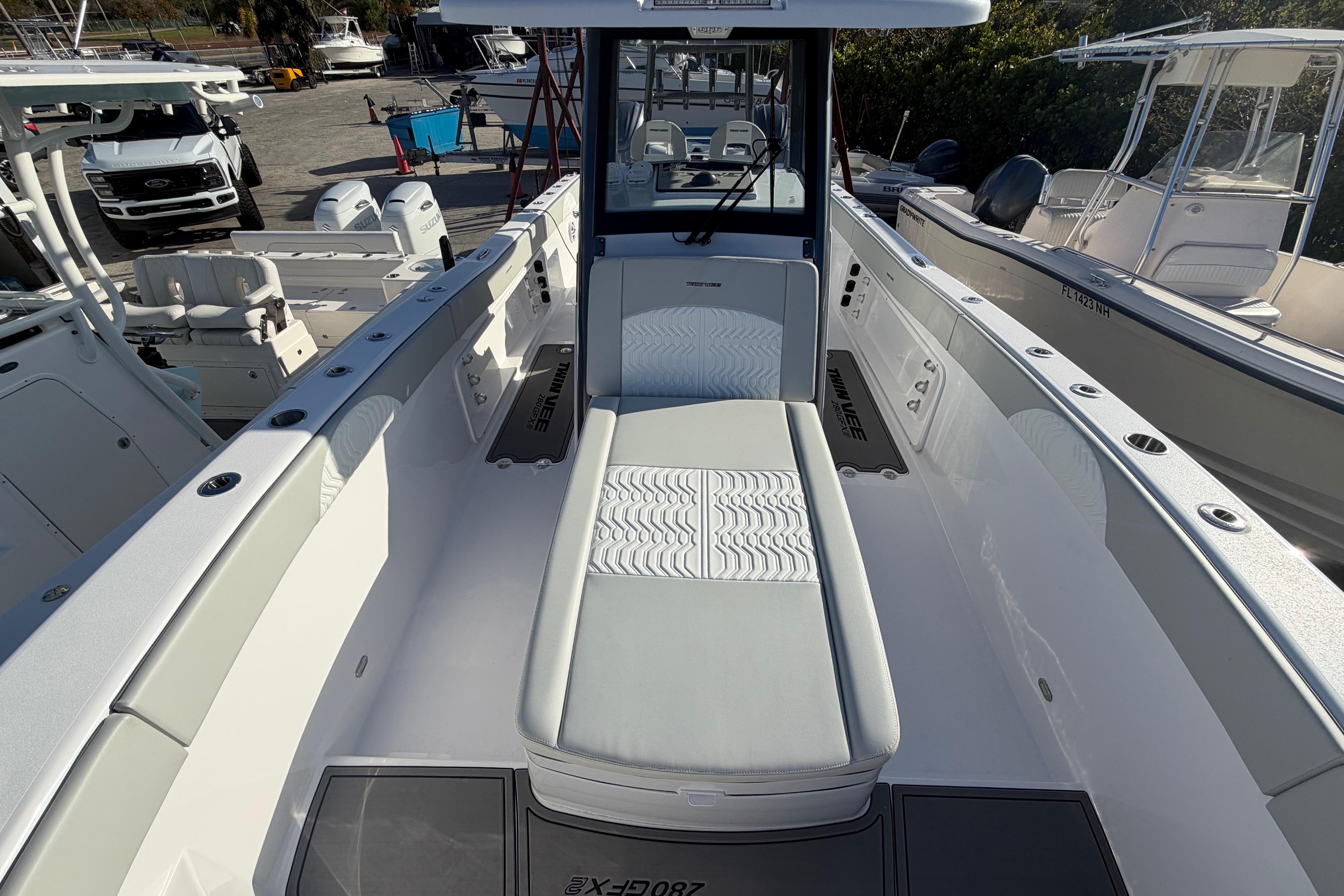 2026 Twin Vee 280 GFX2 CC boat interior, featuring sleek seating and modern design.
