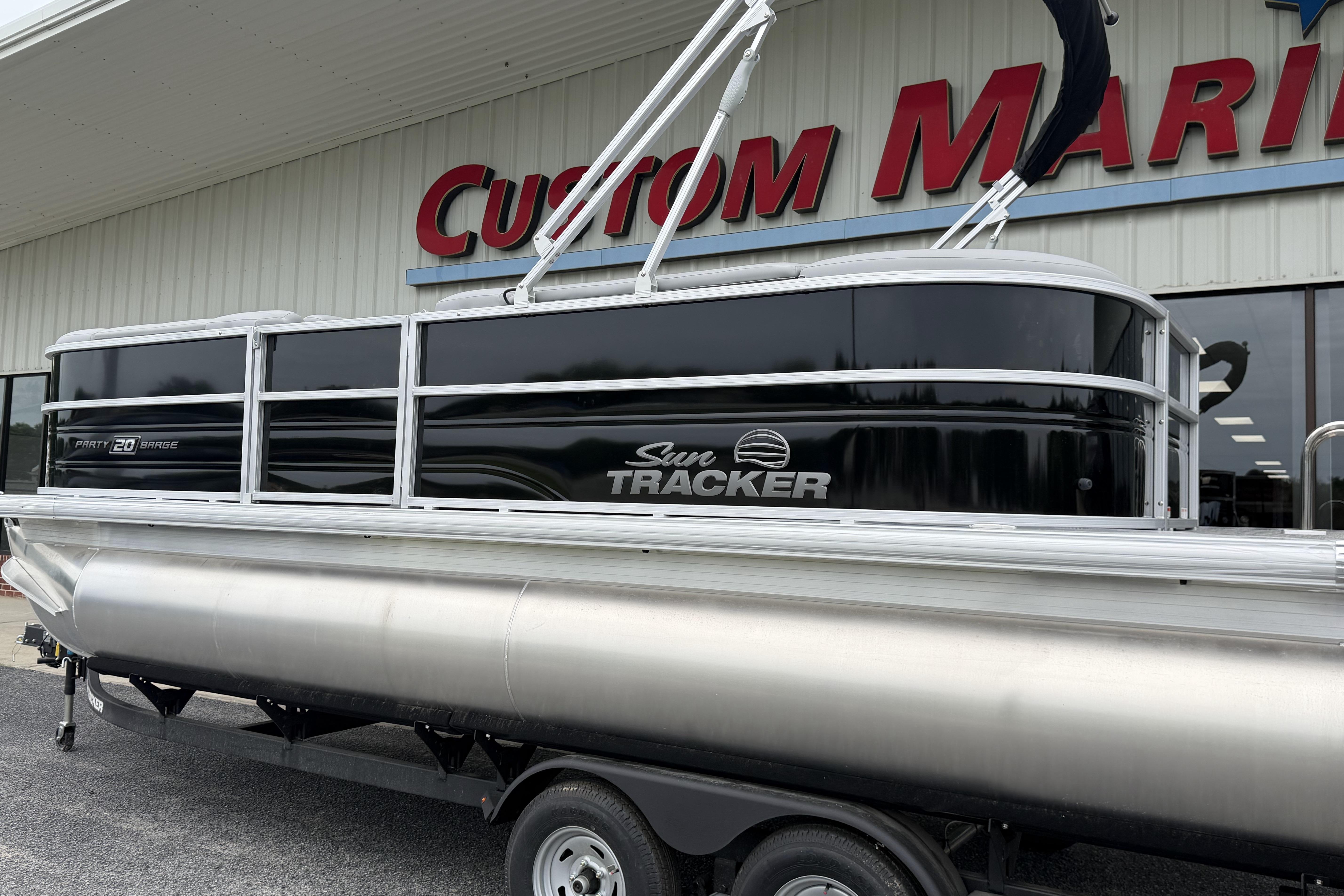 2026 Sun Tracker Party Barge 20 DLX pontoon boat at Custom Marine dealership.