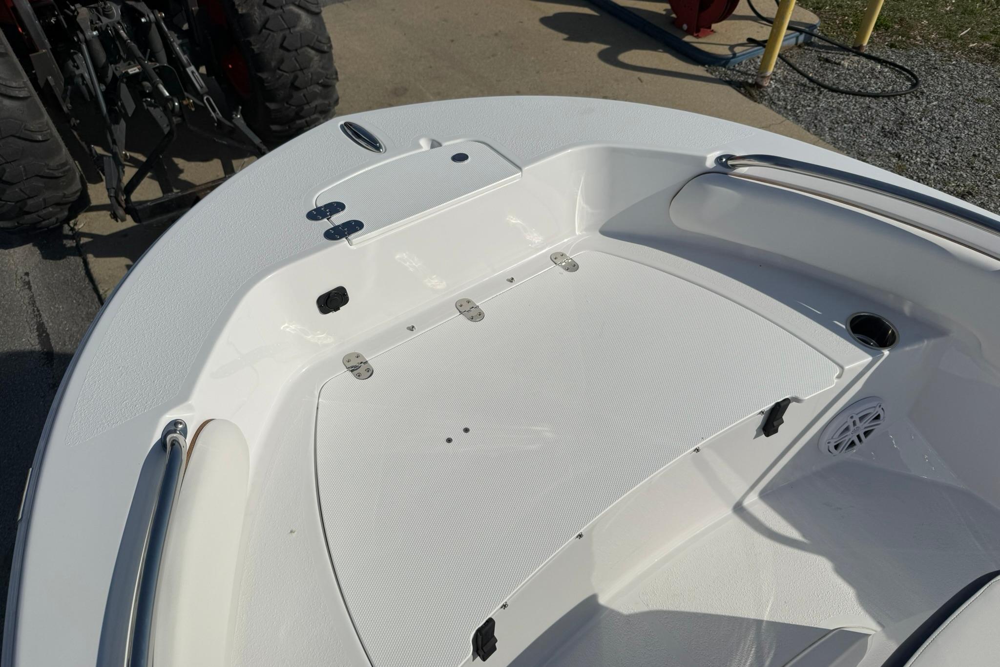 2026 Stingray 173 CC boat interior with white deck and seating area.