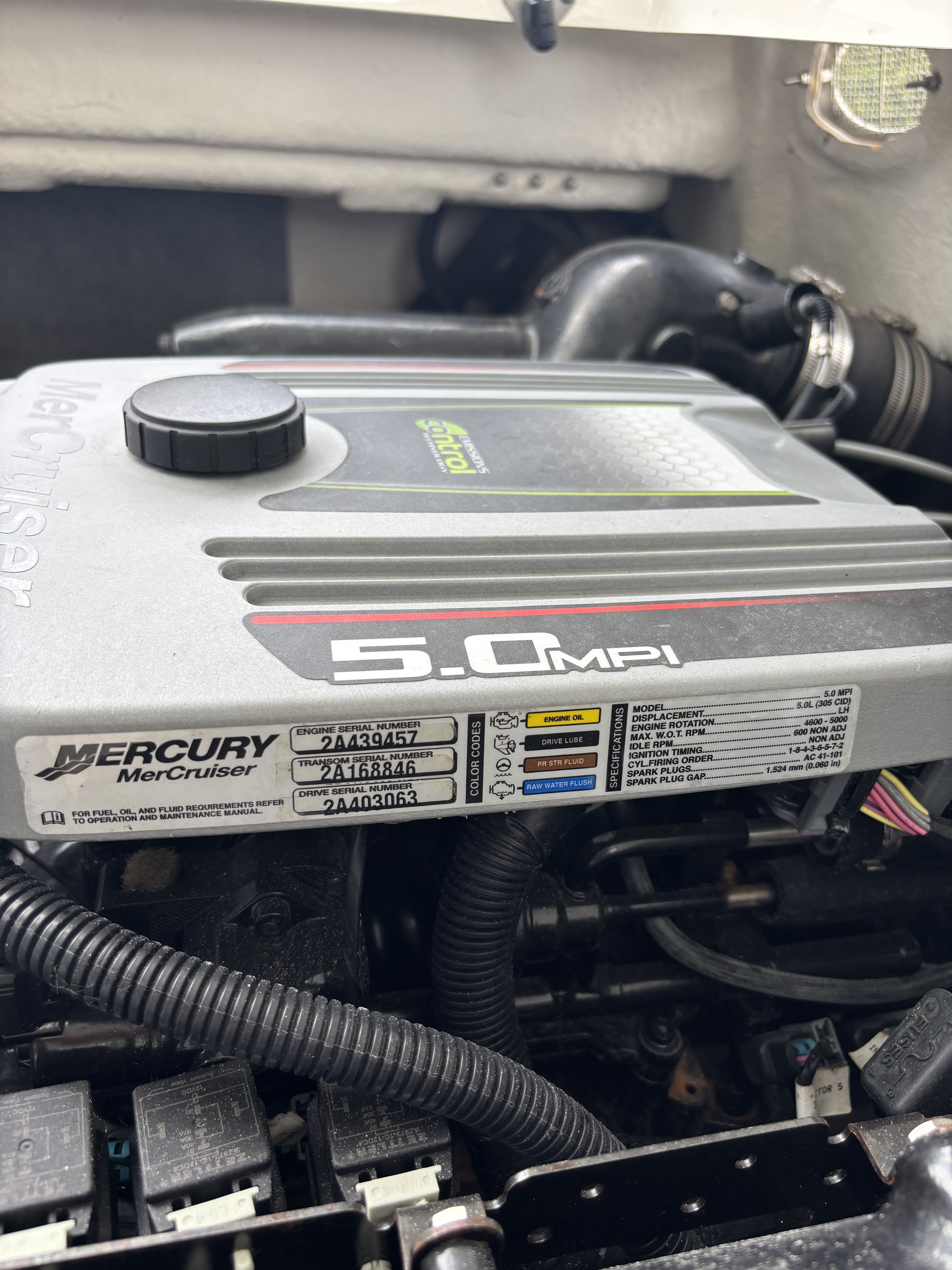 Close-up of a Mercury MerCruiser 5.0 MPI engine in a boat.