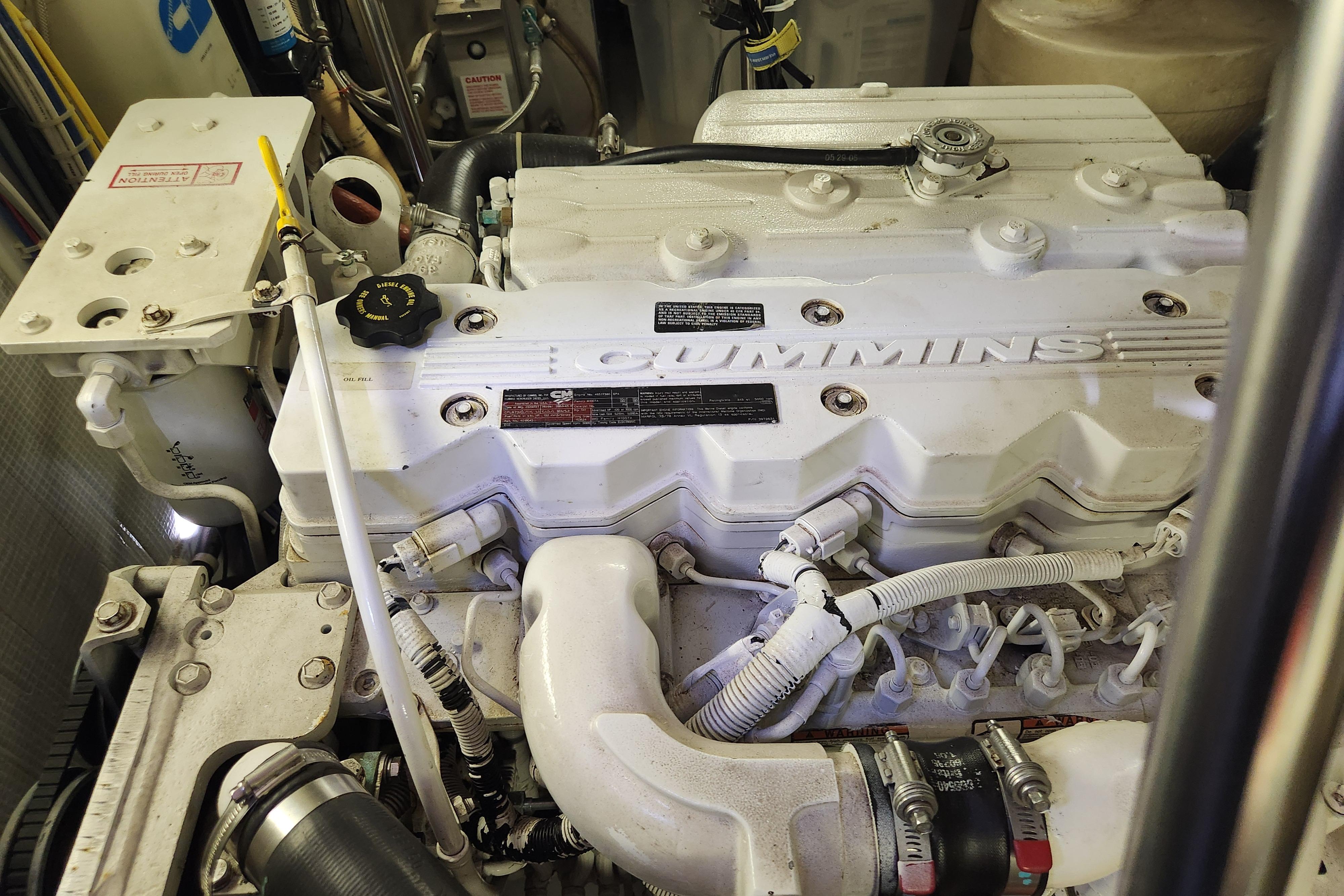 Engine compartment of a 2006 American Tug AT featuring a Cummins engine.