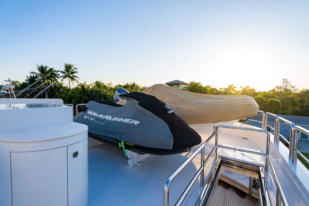 Jet ski on Hargrave Trideck yacht, 2011 model, at sunset.