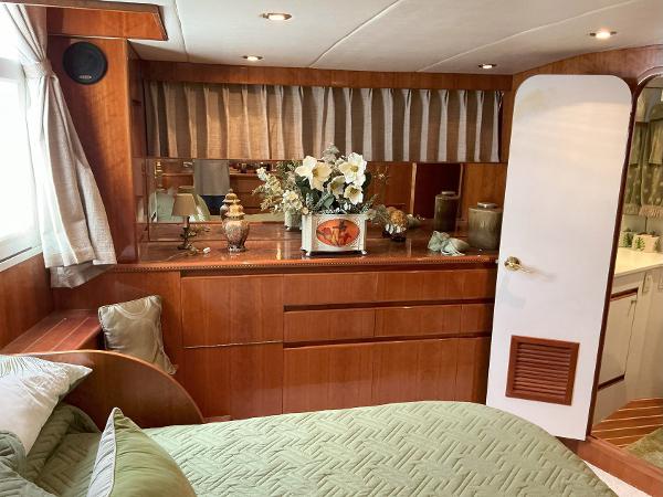 Luxurious cabin interior of 2000 Novatec Islander 55 yacht with elegant wood finish.