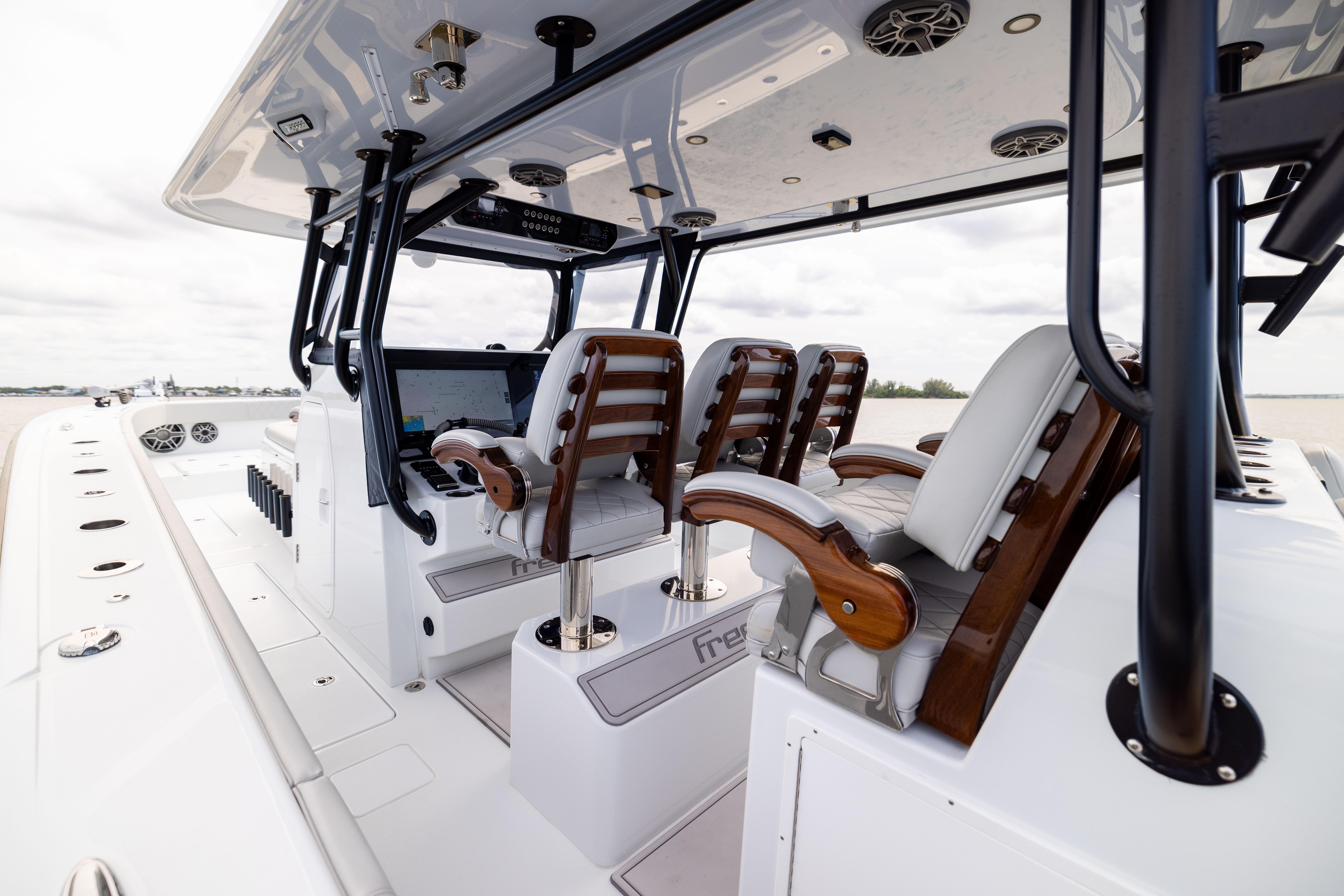 Luxurious 2025 Freeman 42 LR boat interior with sleek seating and modern design.