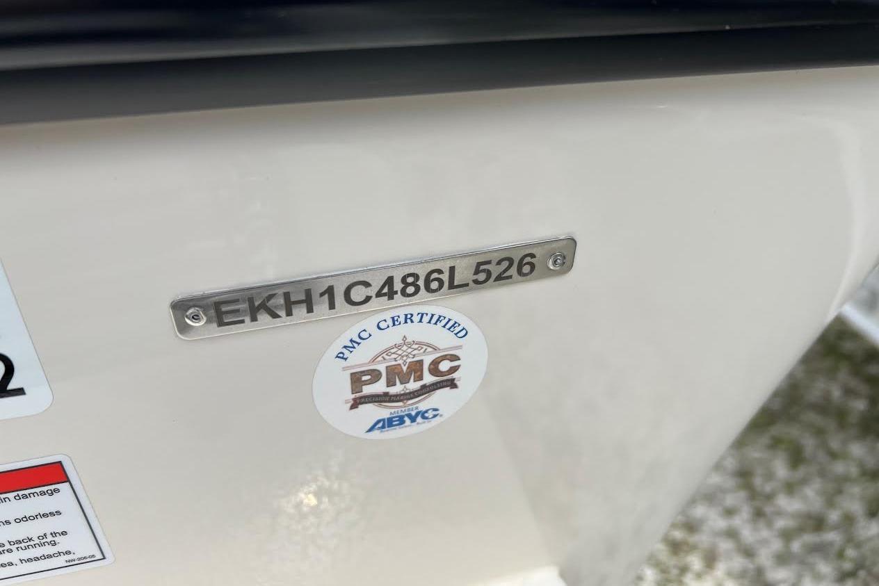 2026 Carolina Skiff 178 JLS boat with PMC certification and hull identification number.