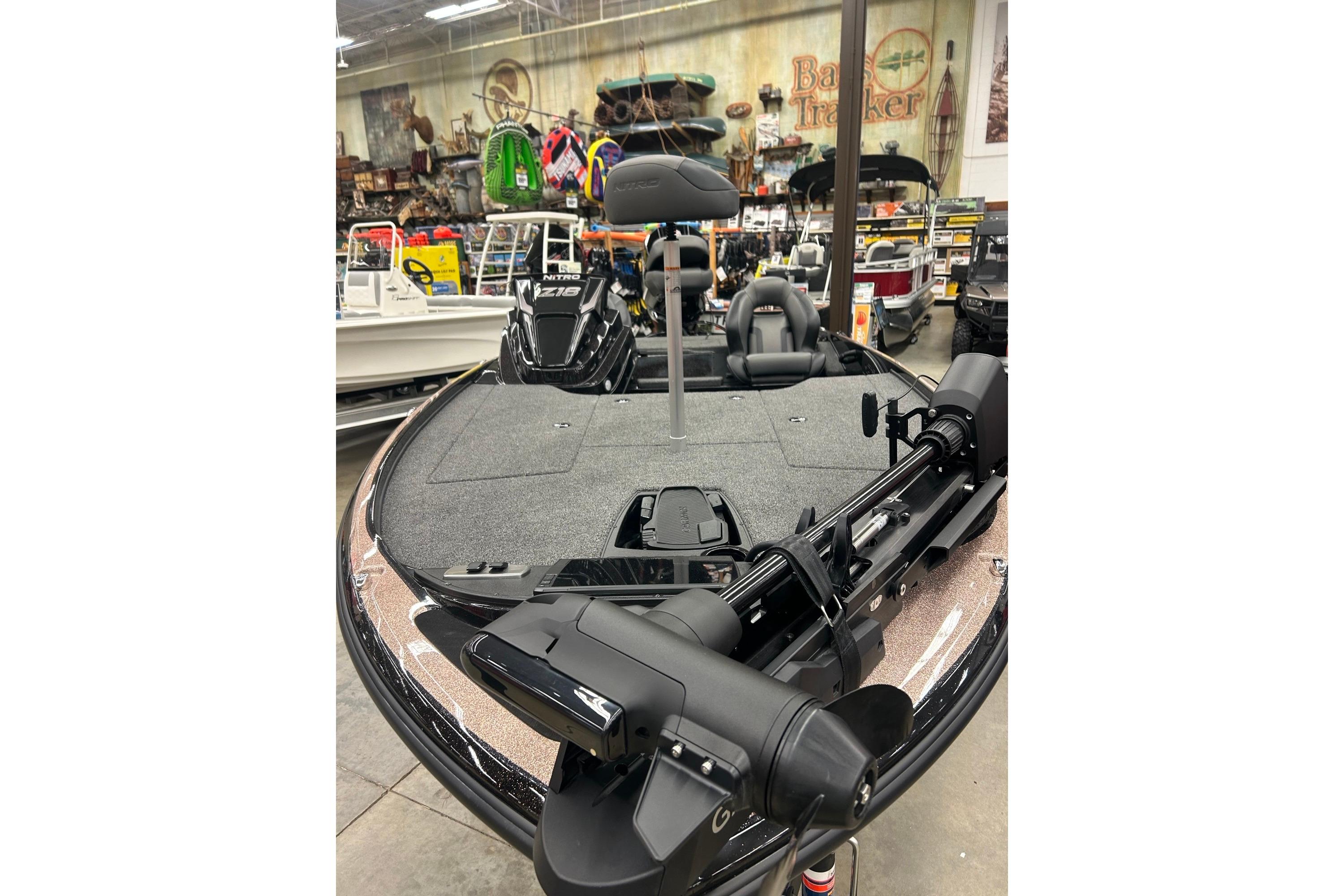2026 Nitro Z18 Pro fishing boat displayed in a showroom with advanced trolling motor.