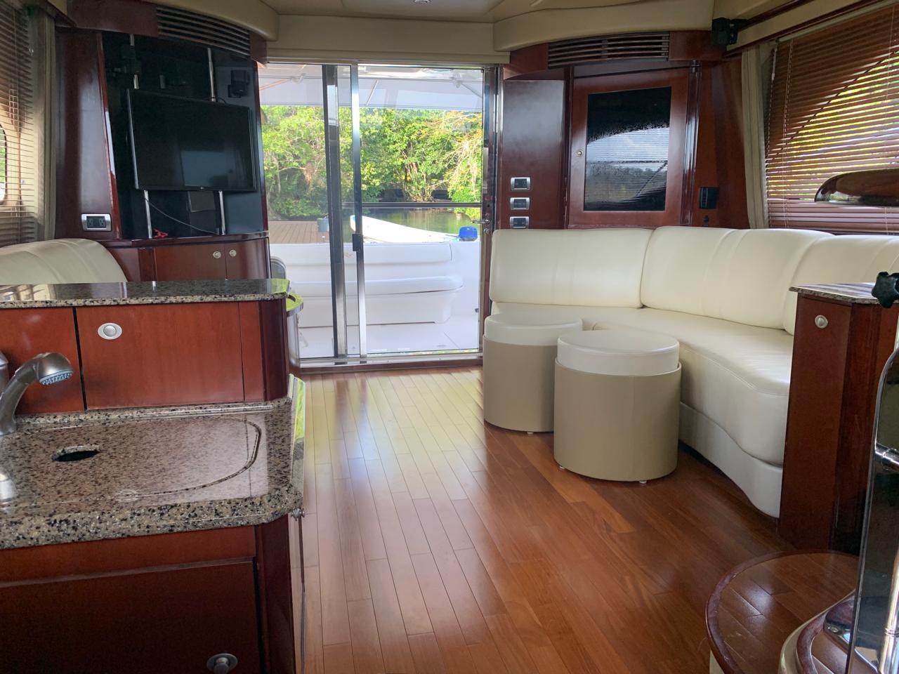 Luxurious interior of 2006 Sea Ray 52 Sedan Bridge yacht with modern furnishings.