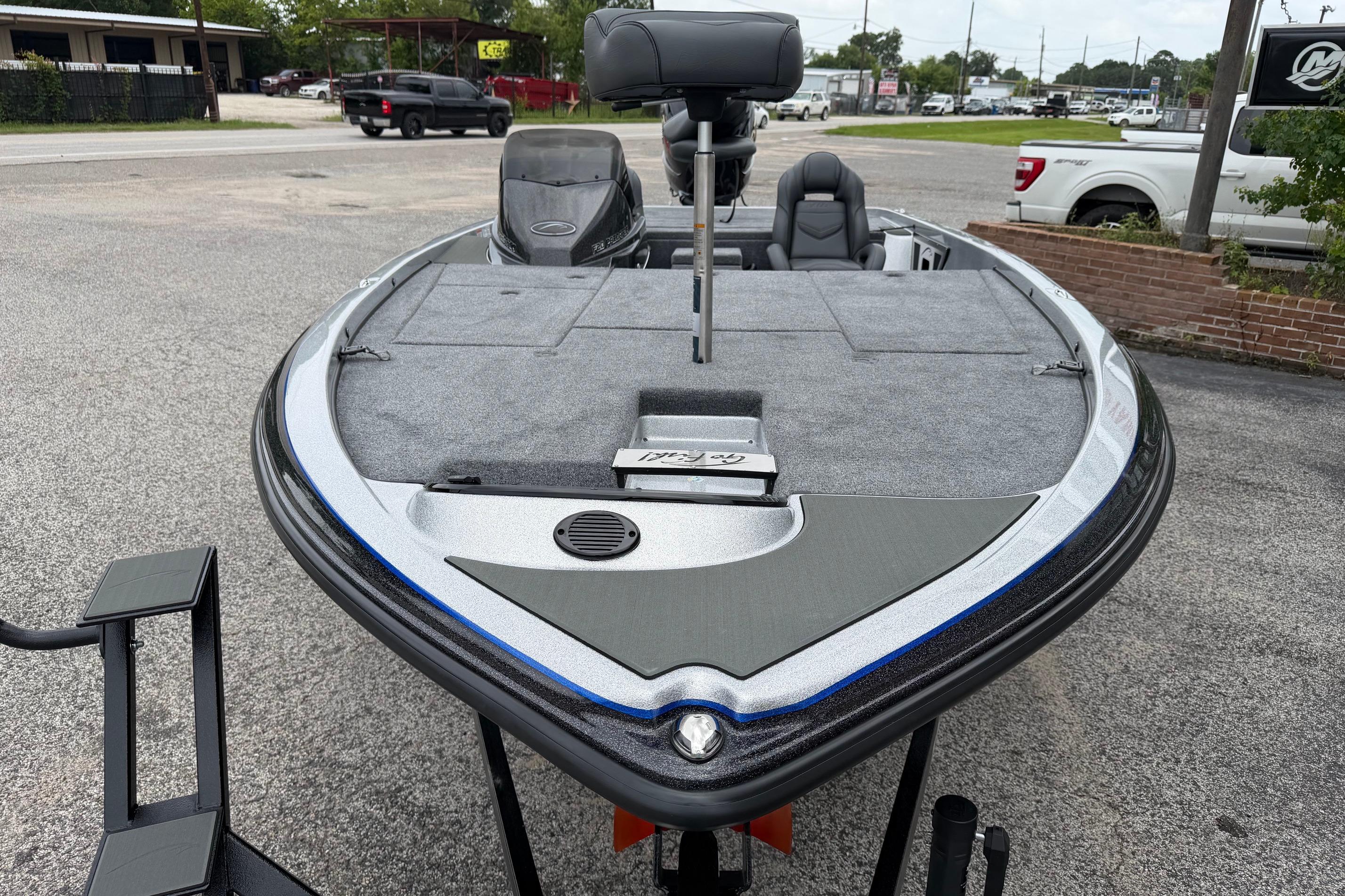 2027 Falcon F20 PREDATOR boat, sleek design, parked outdoors on pavement.