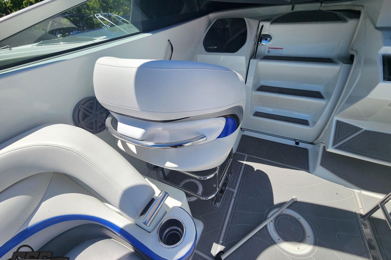 Interior of a 2008 Baja 335 Performance boat, featuring sleek white seating and modern design.