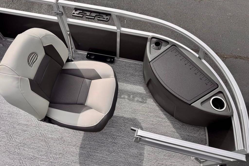 2026 Sun Tracker Bass Buggy 18 DLX boat interior with seating and storage features.