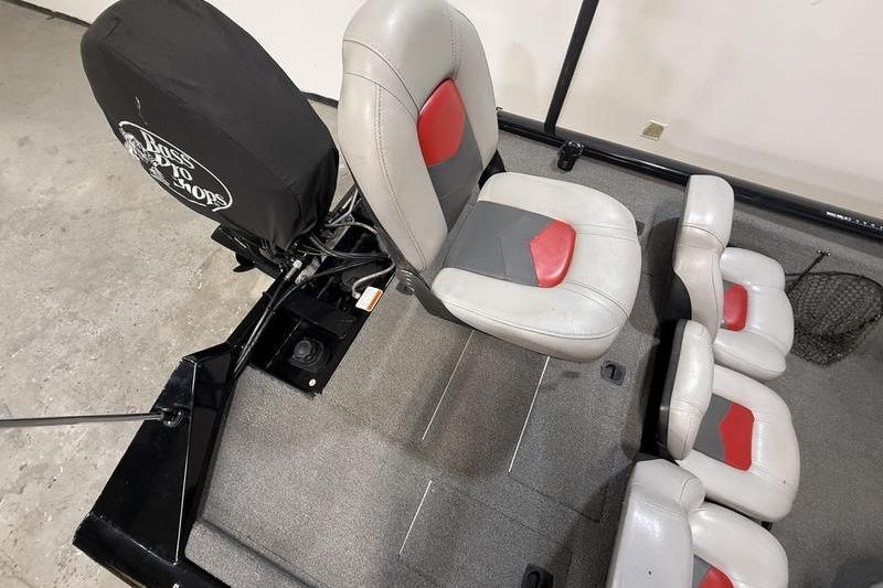 2016 Tracker Pro Team 175 TXW boat interior with gray and red seating.