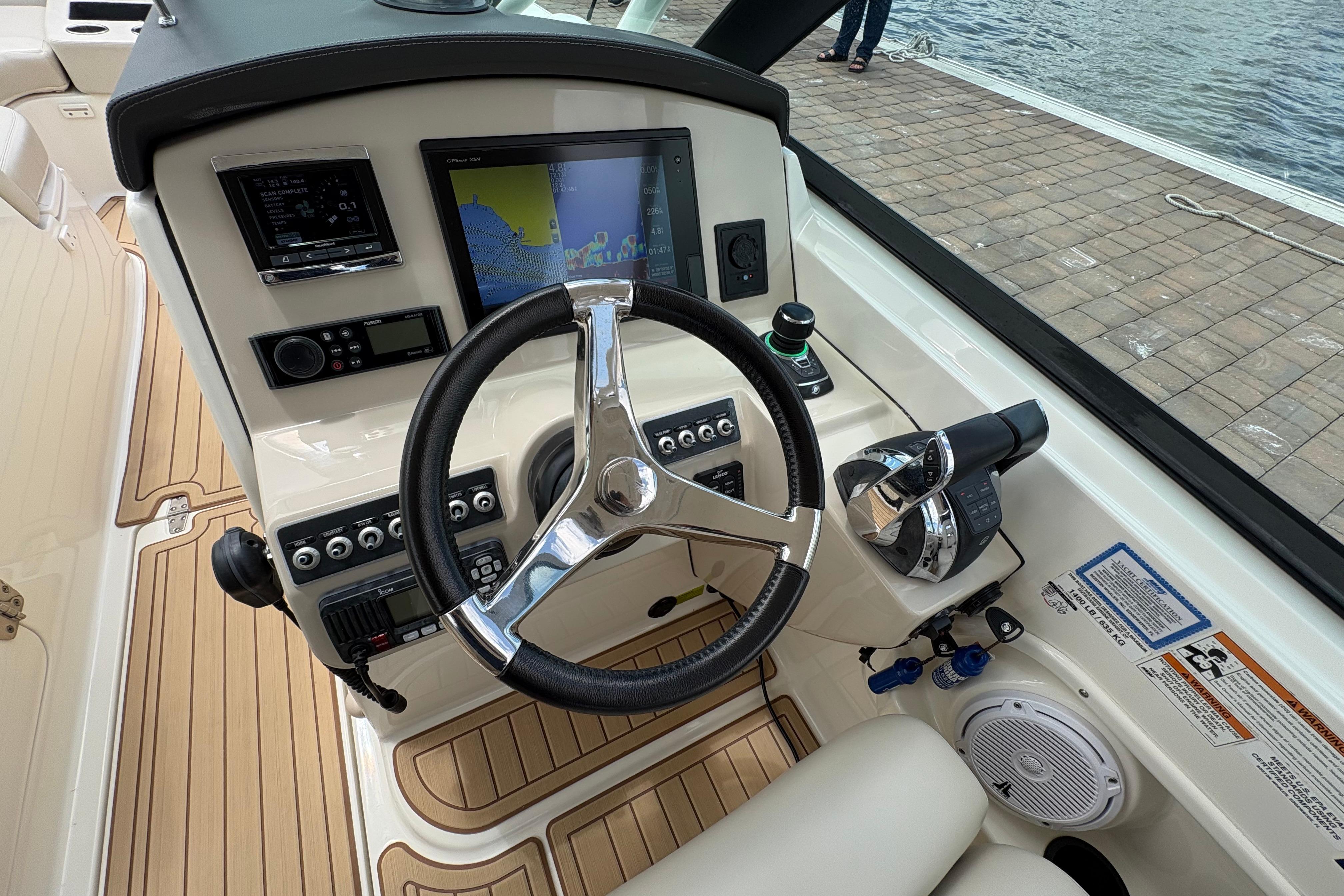 2017 Boston Whaler 270 Vantage helm with navigation display and controls.