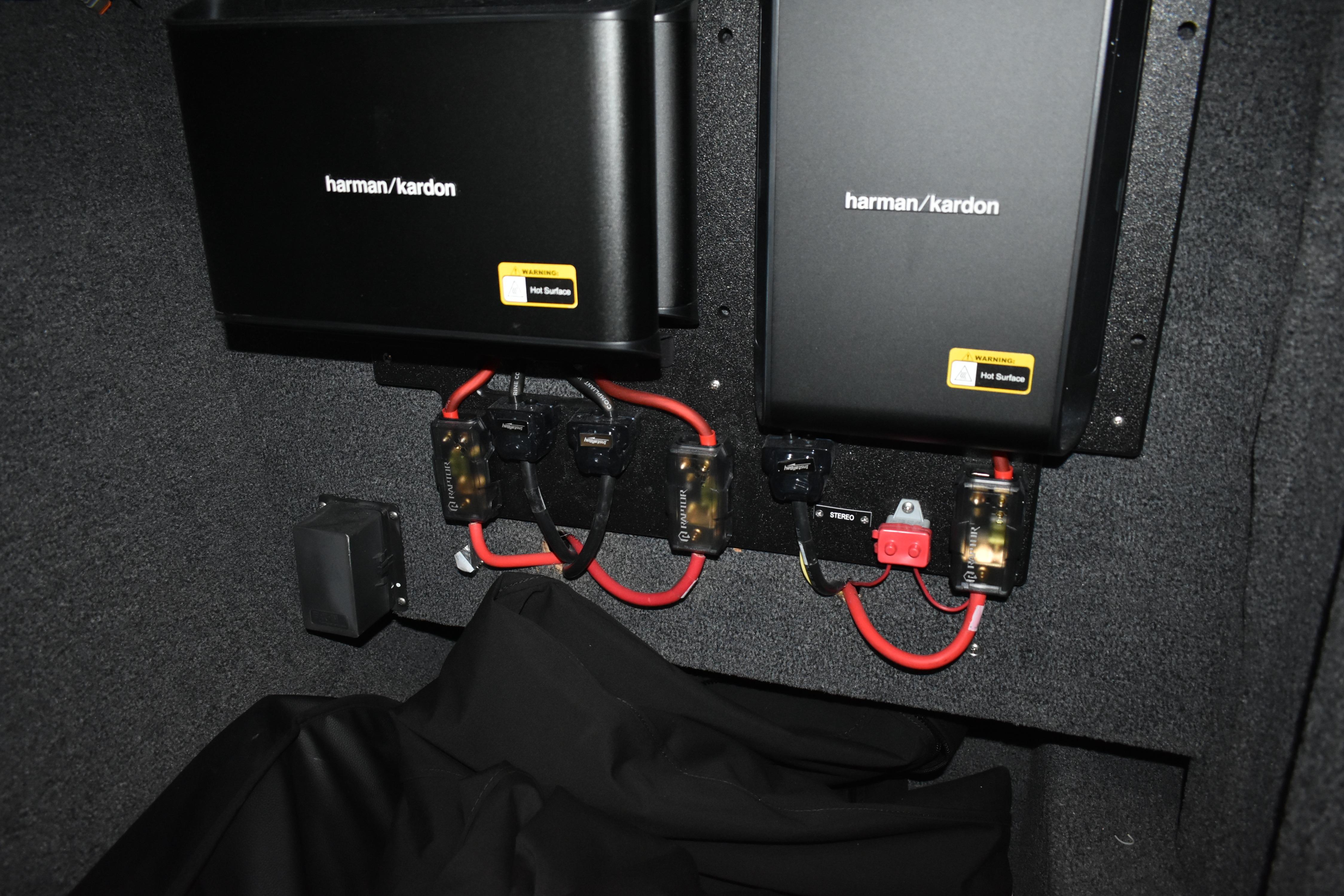 Harman Kardon audio system in 2023 Cobalt R8, featuring wiring and components.