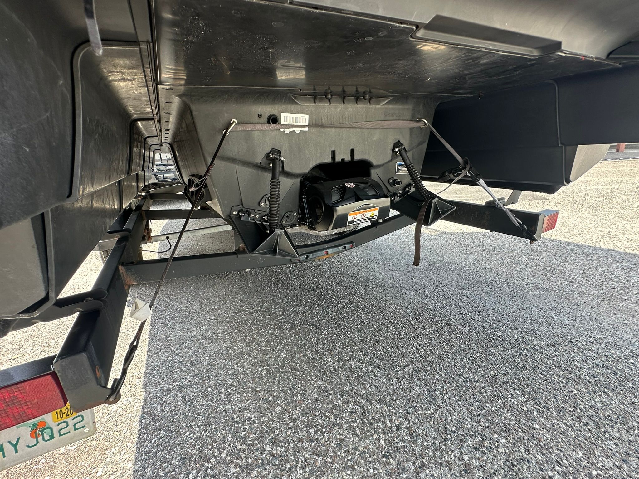 Underside of a 2023 Sea-Doo 21 SWITCH SPORT on a trailer.