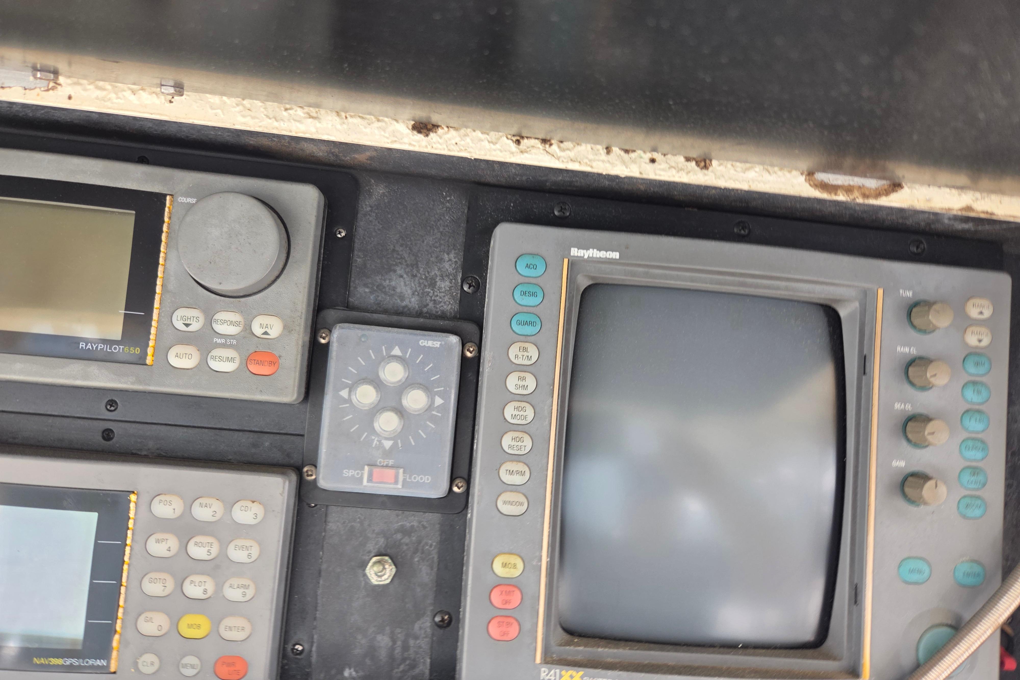 Control panel of a 1990 Egg Harbor Golden Egg 42 boat with navigation instruments.