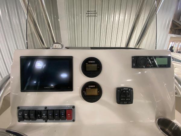 2024 Key West 203 FS boat dashboard with modern controls and display.
