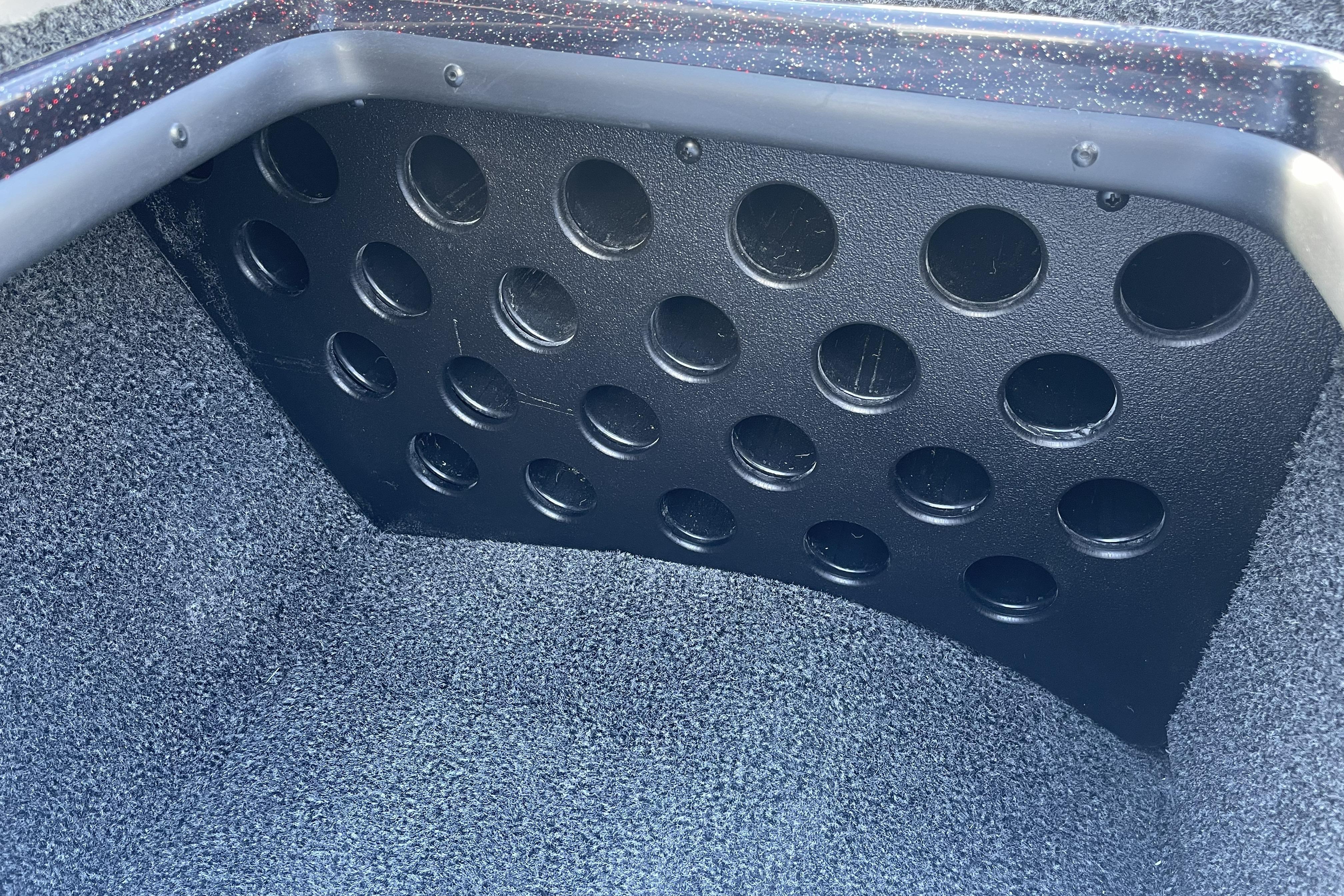 Interior of 2026 Nitro Z19 XL boat with circular storage compartments.