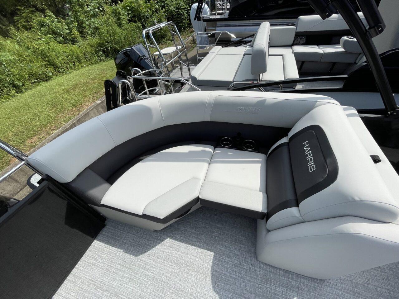2026 Harris Cruiser 230 boat interior with plush seating and modern design.