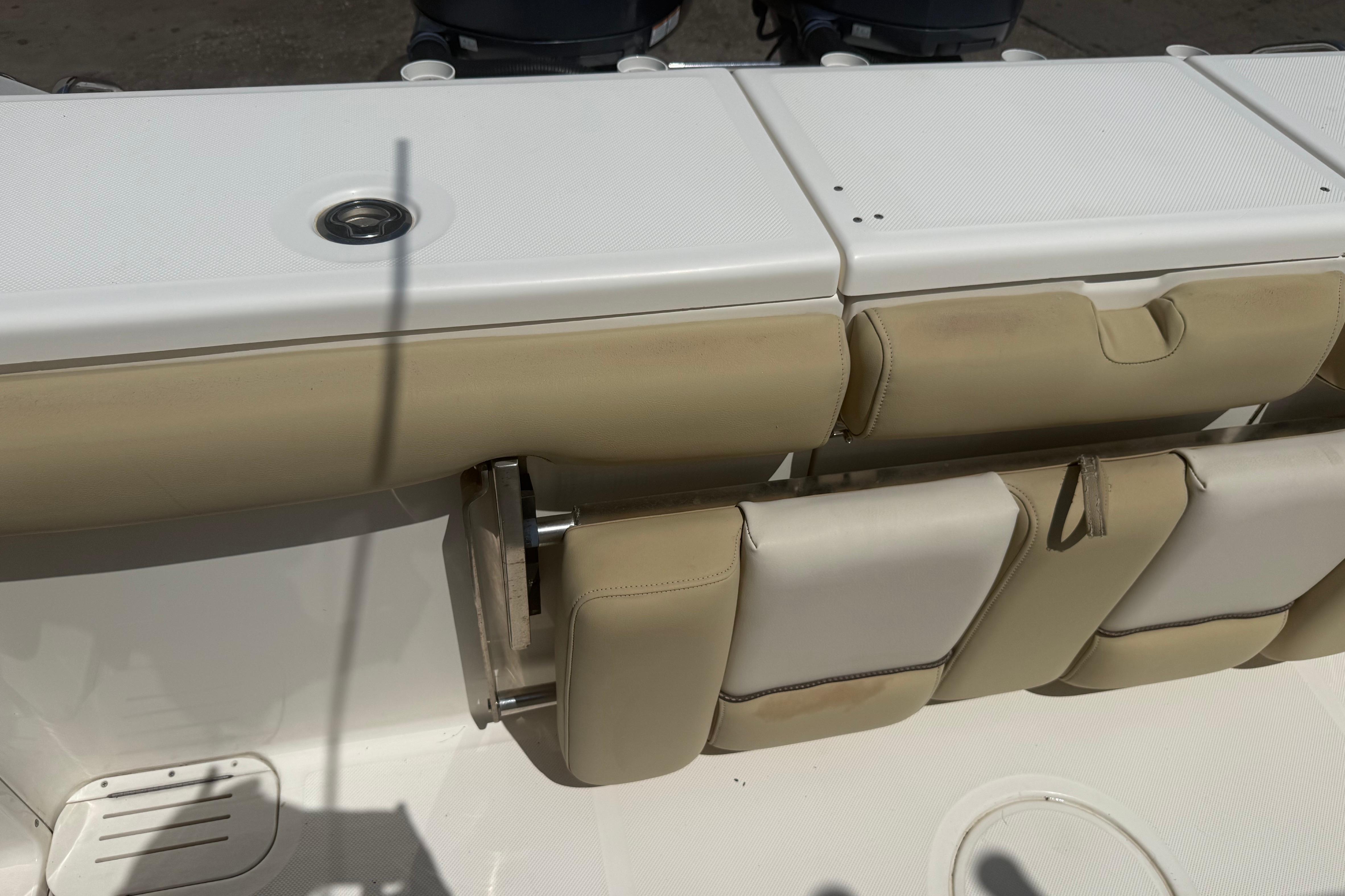2019 Key West Billistic 281 Center Console boat seating and storage compartments.