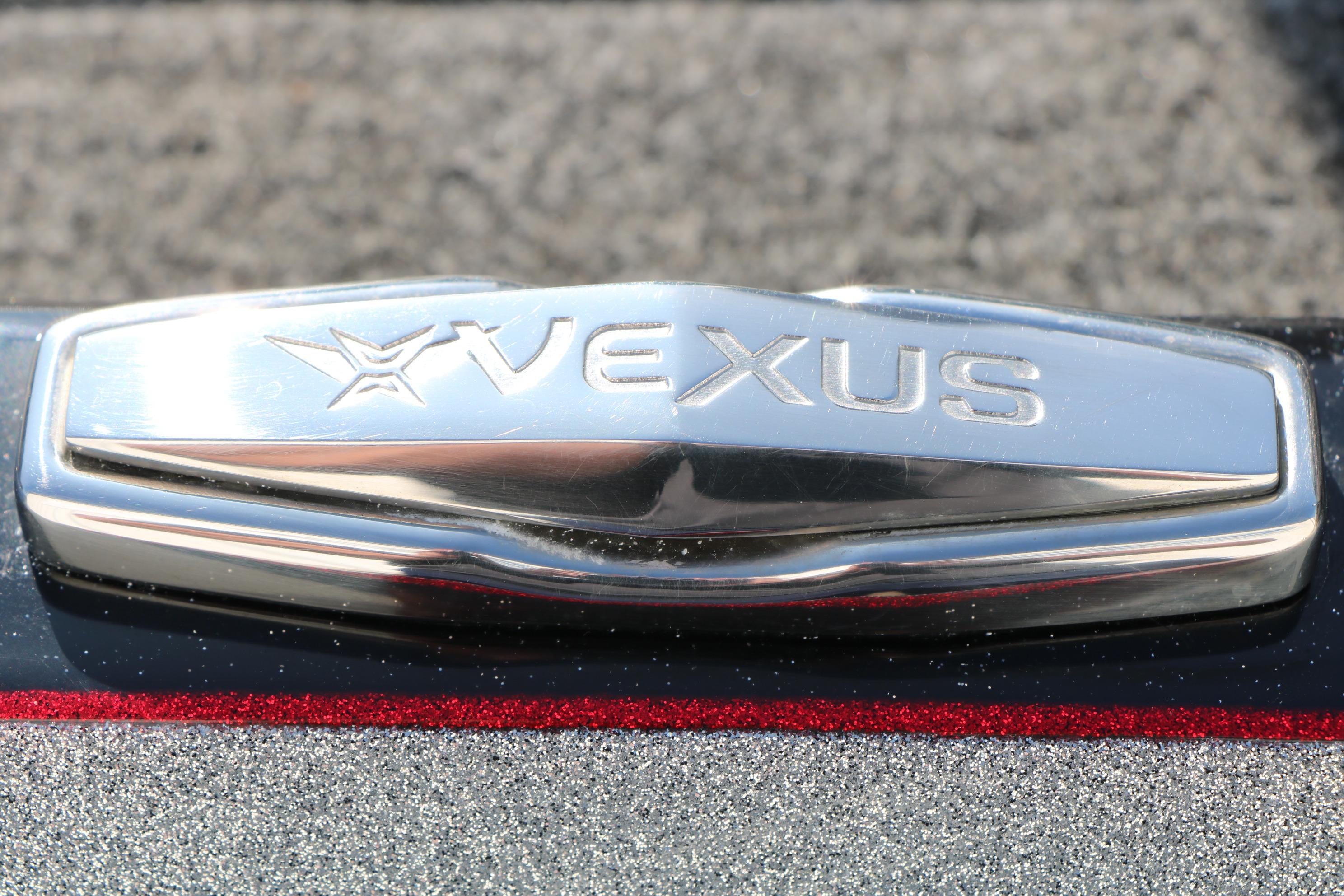 Chrome Vexus logo on 2022 VX21 boat, close-up view.