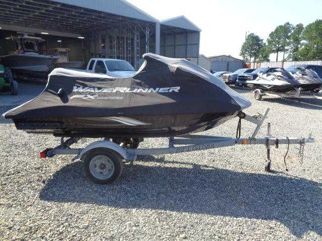 2015 Yamaha WaveRunner FX Cruiser H/O on trailer, covered, parked outdoors.