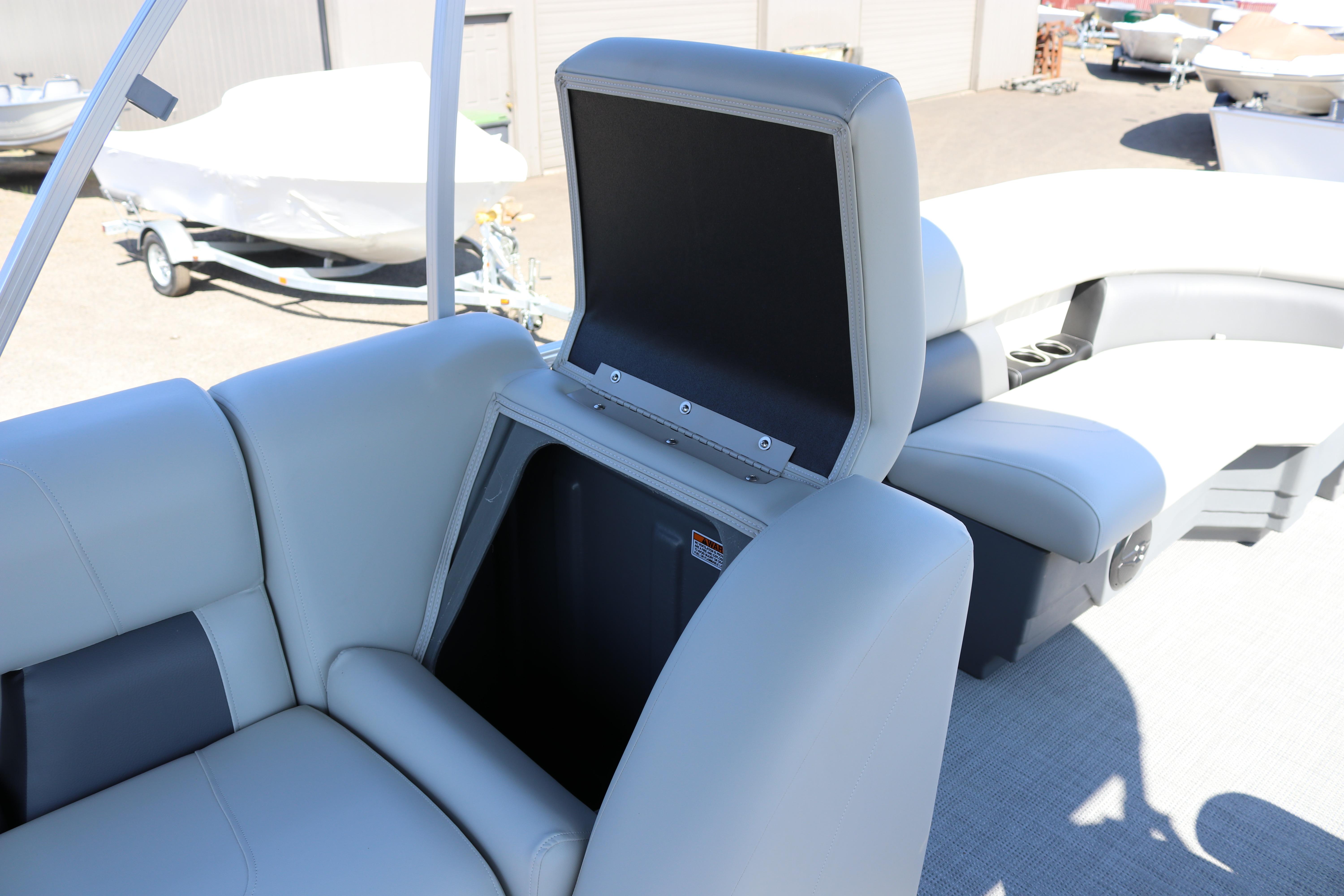 SunChaser Vista 20 Fish 2025 boat interior with open storage compartment.