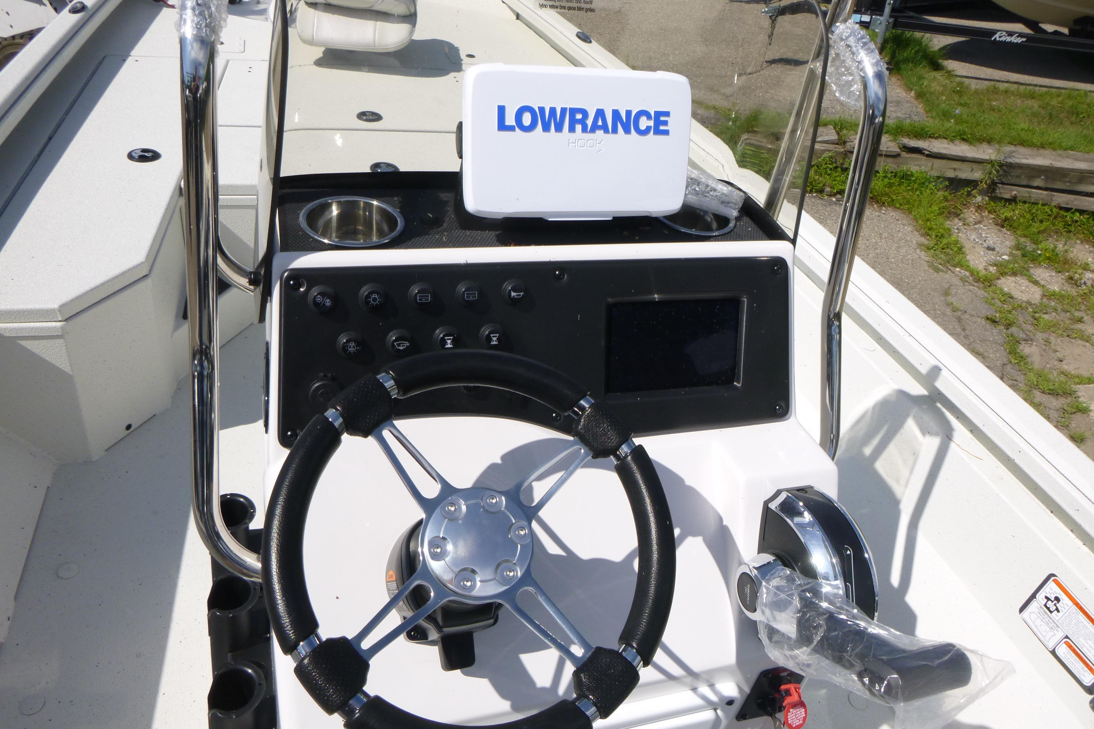 2025 Ranger RB210 boat console with steering wheel and Lowrance navigation system.