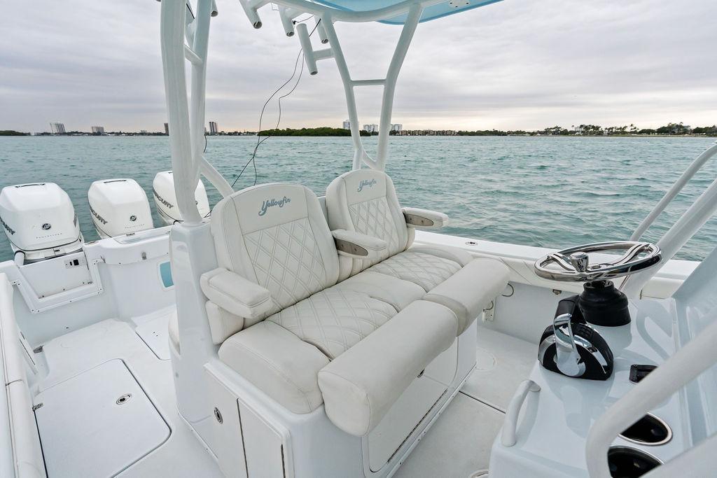 2021 Yellowfin 36 Offshore boat interior with plush seating and ocean view.