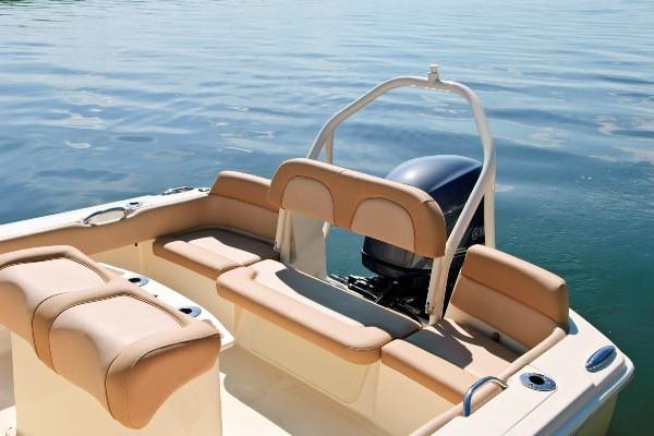 Manufacturer Provided Image: 2020 Scout 195 Sportfish boat interior with tan seating and outboard motor.